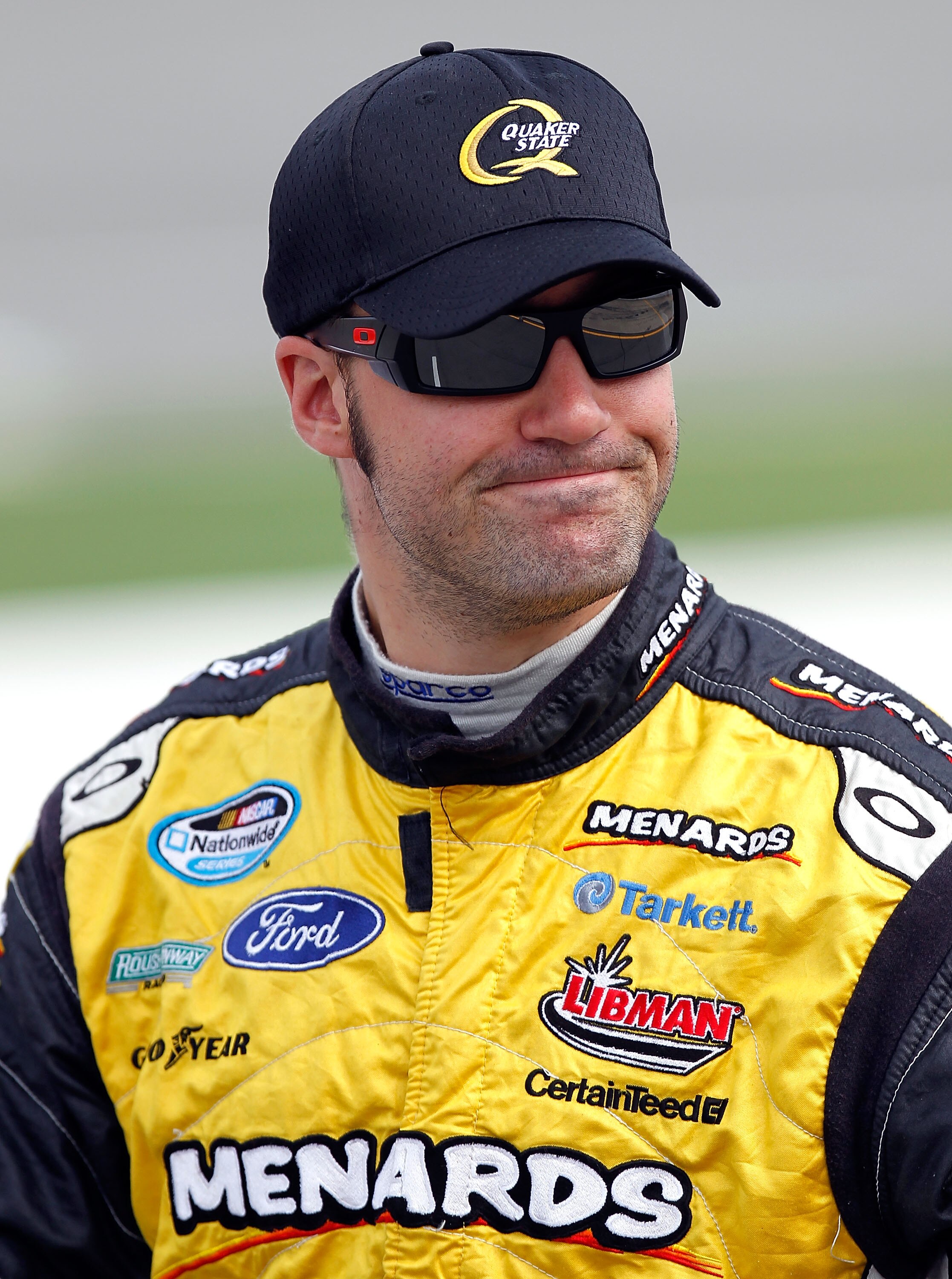 BROOKLYN, MI - AUGUST 14:  Paul Menard, driver of #98 the Richmond / Menards, looks on during qualifying for the NASCAR Nationwide Series CARFAX 250 at Michigan International Speedway on August 14, 2010 in Brooklyn, Michigan.  (Photo by Jeff Zelevansky/Ge