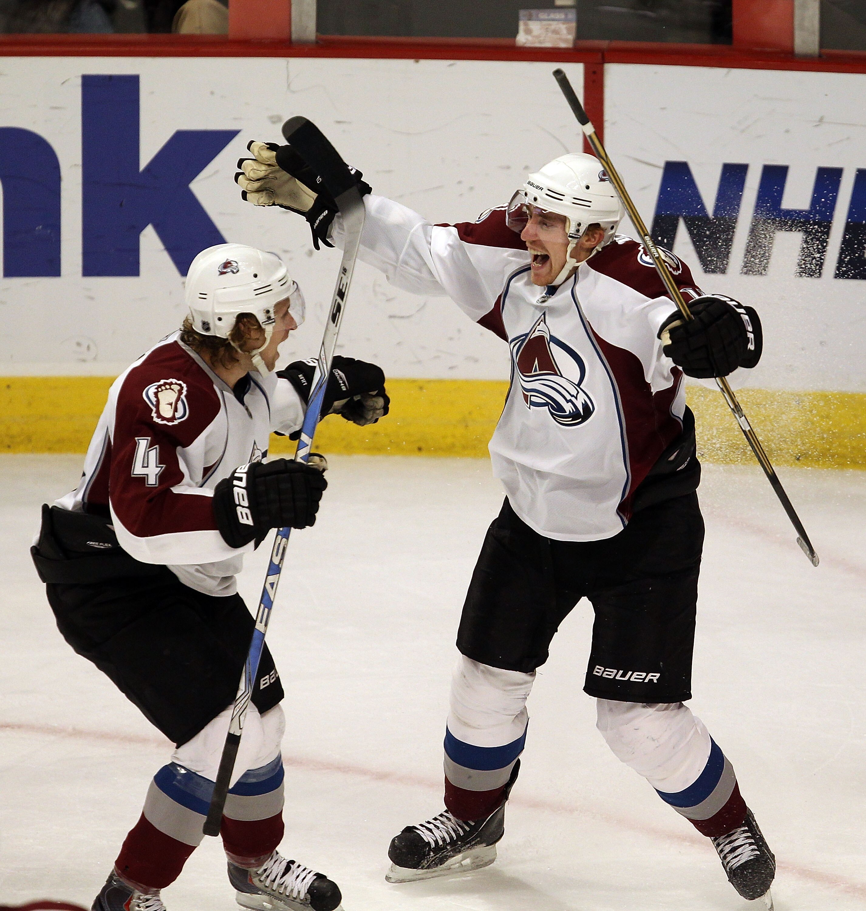 CHICAGO, IL - DECEMBER 15: Tomas Fleischmann #14 of the Colorado Avalanche celebrates his third goal of the game, all scored in the 3rd period against the Chicago Blackhawks, with teammate John Mihchael Liles at the United Center on December 15, 2010 in C