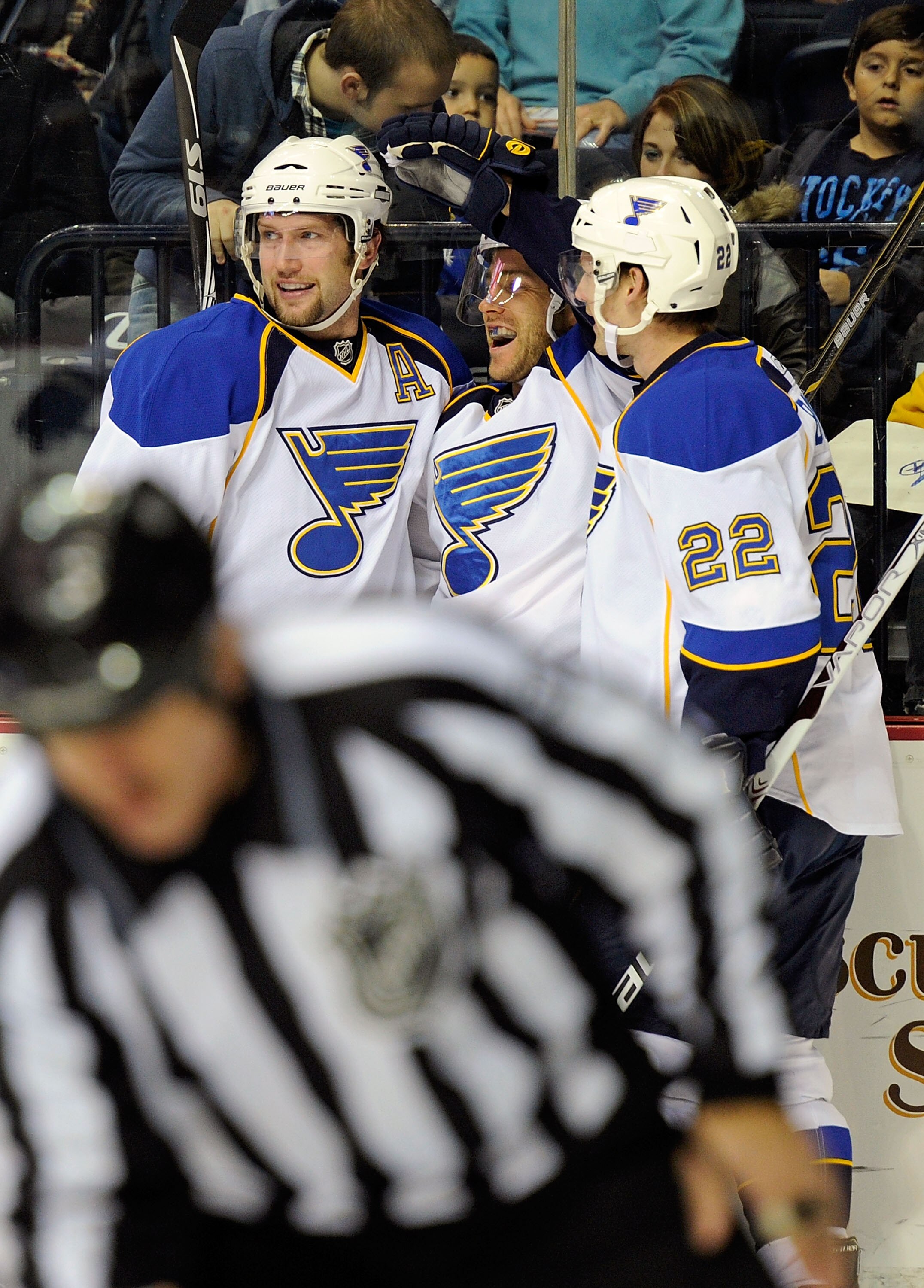 NASHVILLE, TN - NOVEMBER 24:  David Backes #42, Andy McDonald #10, and Brad Boyes #22 of the St. Louis Blues celebrate a goal against the Nashville Predators on November 24, 2010 at the Bridgestone Arena in Nashville, Tennessee.  (Photo by Frederick Breed