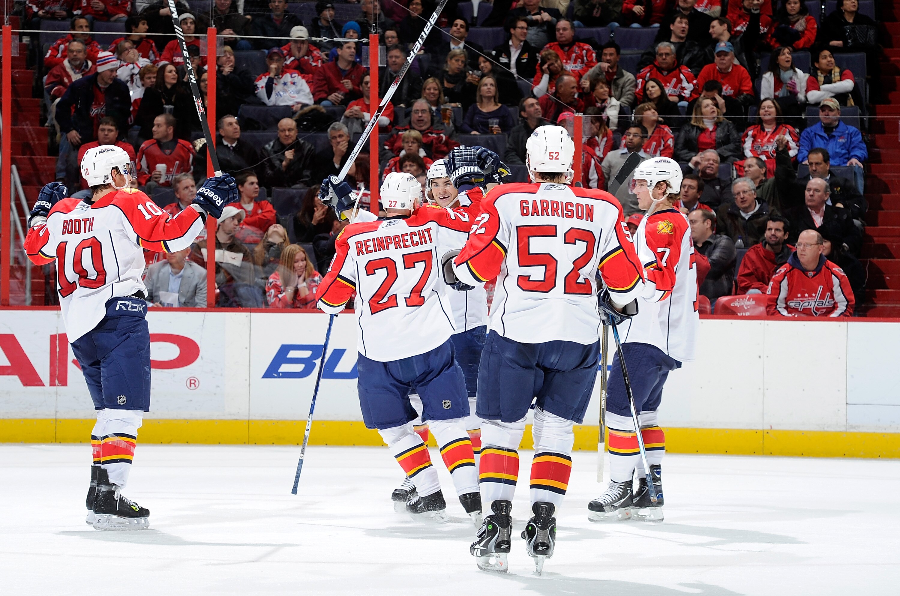 WASHINGTON, DC - DECEMBER 09:  Michael Frolik #67 of the Florida Panthers celebrates with teammates after scoring in the second period against the Washington Capitals at the Verizon Center on December 9, 2010 in Washington, DC.  (Photo by Greg Fiume/Getty