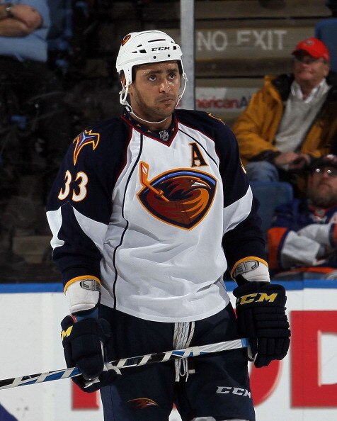 UNIONDALE, NY - DECEMBER 11:  Dustin Byfuglien #33 of the Atlanta Thrashers looks on against the New York Islanders on December 11, 2010 at Nassau Coliseum in Uniondale, New York. The Thrashers defeated the Isles 5-4.  (Photo by Jim McIsaac/Getty Images)