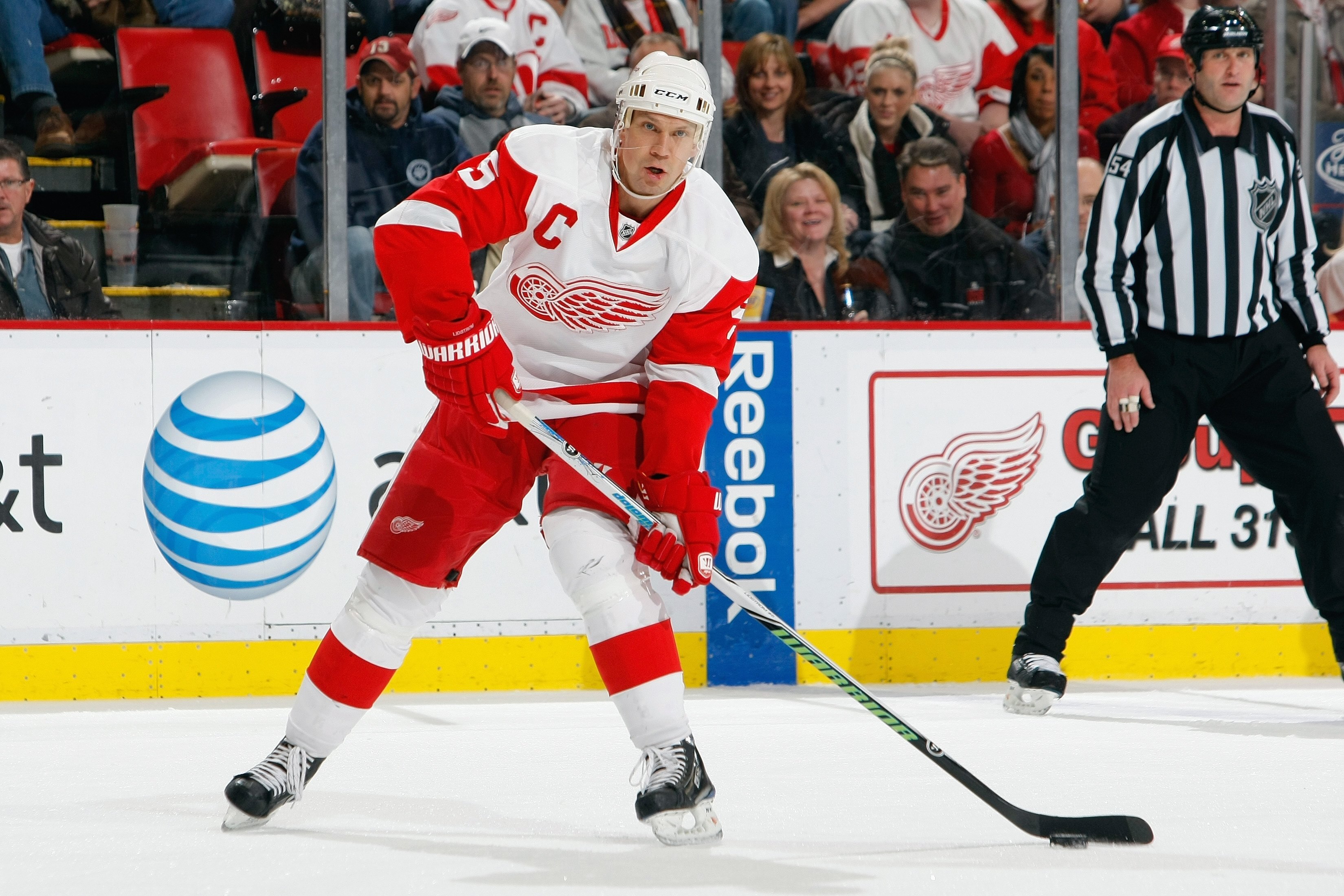 DETROIT - DECEMBER 9:  Nicklas Lidstrom #5 of the Detroit Red Wings skates with the puck during the game against the St. Louis Blues at Joe Louis Arena on December 9, 2009 in Detroit, Michigan. (Photo by Dave Sandford/Getty Images)