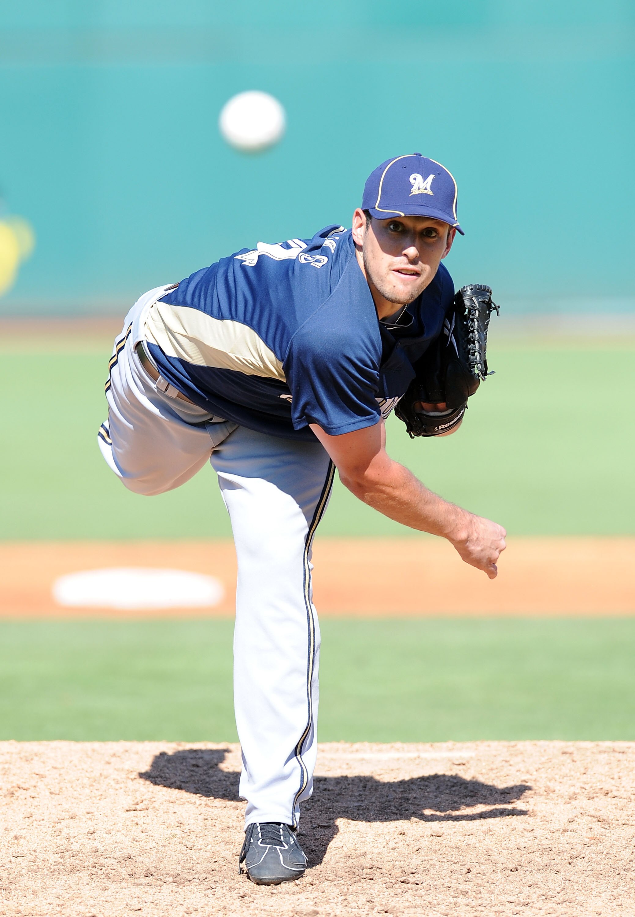 GOODYEAR, AZ - MARCH 11:  Mark Rogers #64 of the Milwaukee Brewers pitches during a Spring Training game against the Cincinnati Reds on March 11, 2010 at Goodyear Ballpark in Goodyear, Arizona.  (Photo by Lisa Blumenfeld/Getty Images)