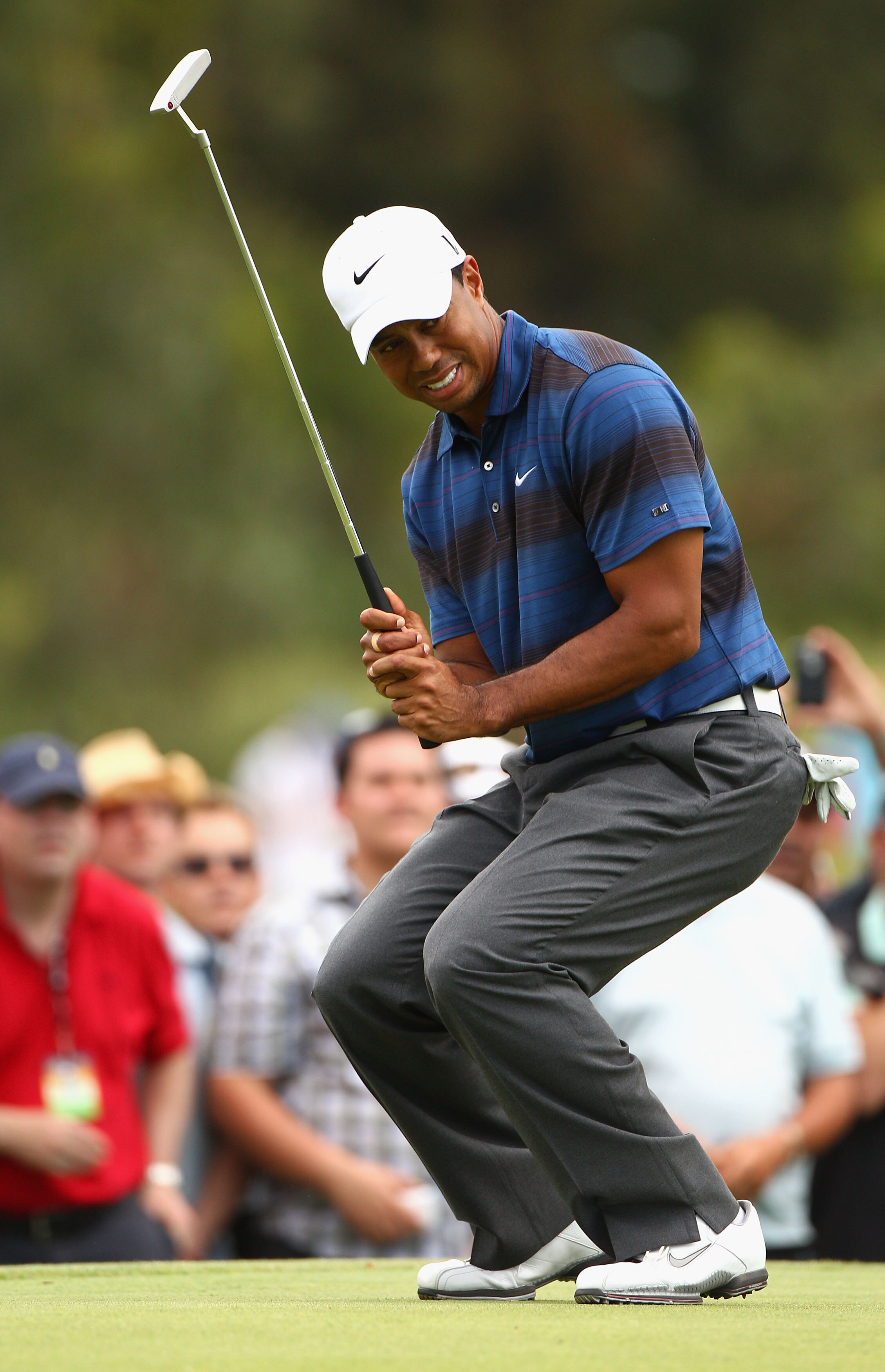 MELBOURNE, AUSTRALIA - NOVEMBER 12:  Tiger Woods of the USA misses a putt during day two of the Australian Masters at The Victoria Golf Club on November 12, 2010 in Melbourne, Australia.  (Photo by Ryan Pierse/Getty Images)