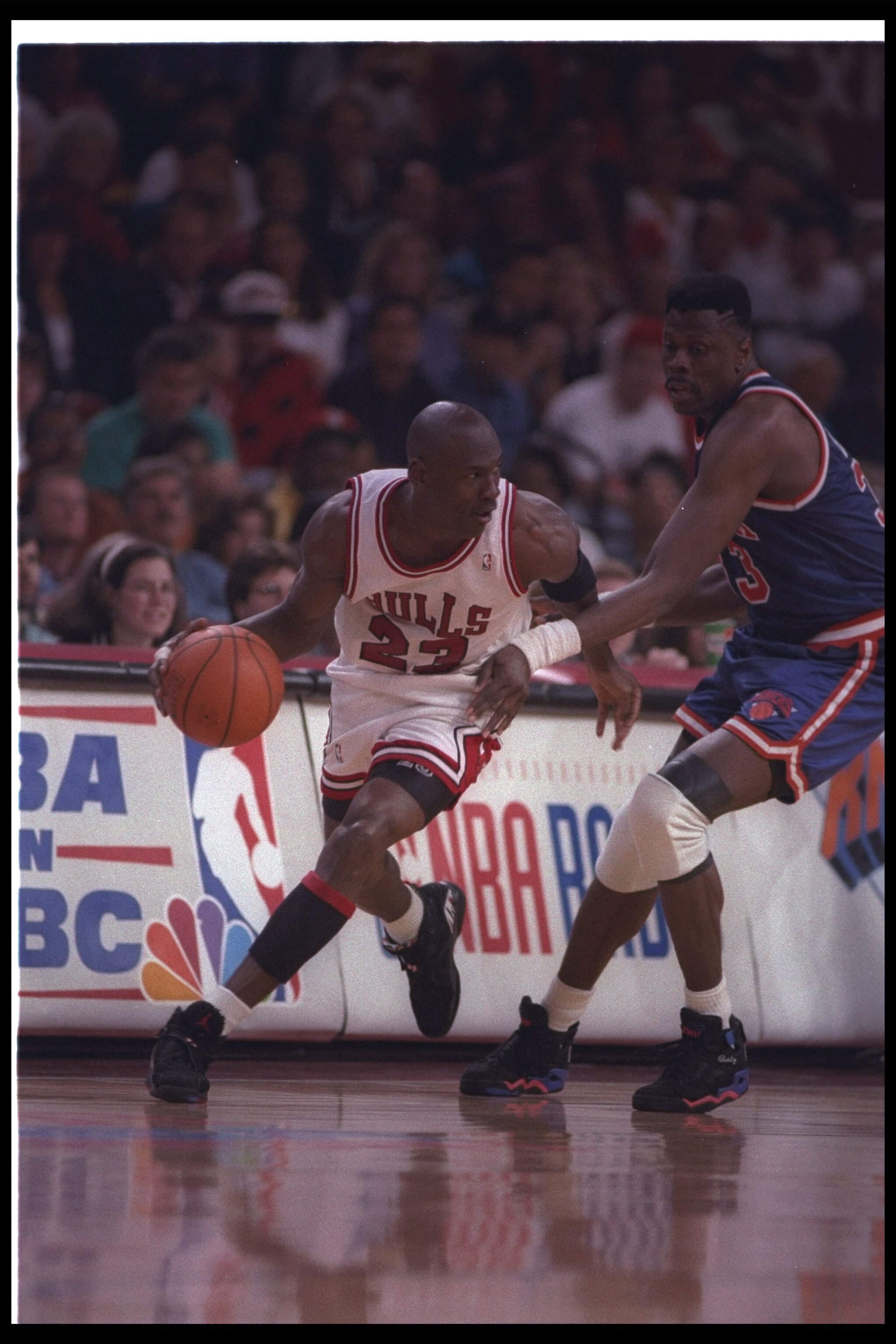 1993:  Guard Michael Jordan of the Chicago Bulls (left) works against the New York Knicks during the Eastern Conference finals at the United Center in Chicago, Illinois.  The Bulls won the game, 103-83. Mandatory Credit: Jonathan Daniel  /Allsport
