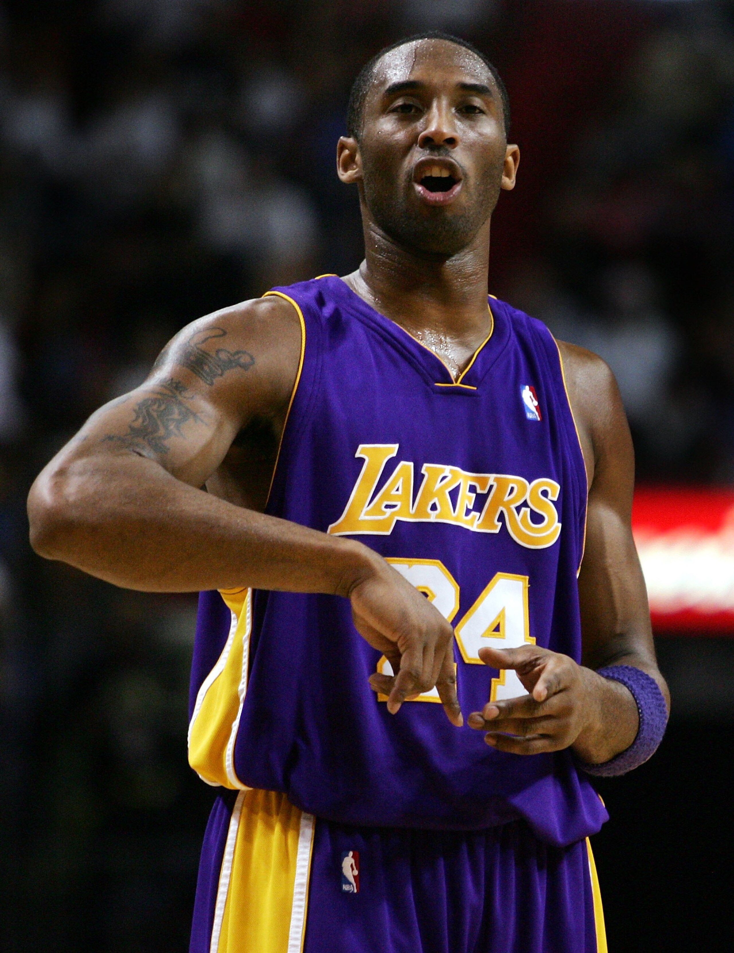 MIAMI - DECEMBER 25:  Guard Guard Kobe Bryant #24 of the Los Angeles Lakers argues a call during a game against the Miami Heat on December 25, 2006 at the American Airlines Arena in Miami, Florida.  NOTE TO USER: User expressly acknowledges and agrees tha