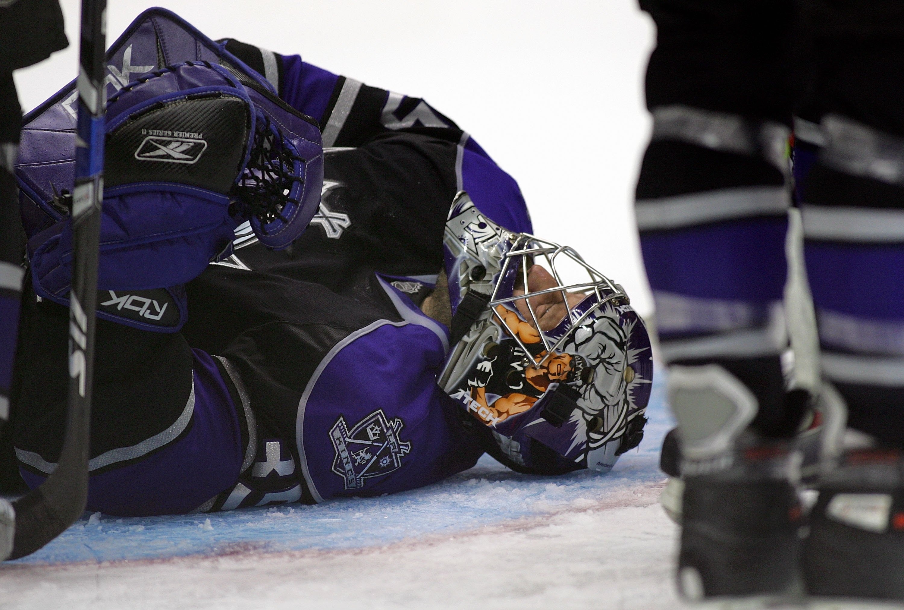 LOS ANGELES, CA - DECEMBER 01:  Goaltender Jason LaBarbera #35 of the Los Angeles Kings lays on the ice after being injured on a play in the crease late in third period during their NHL game against the Colorado Avalanche on December 1, 2007 at the Staple