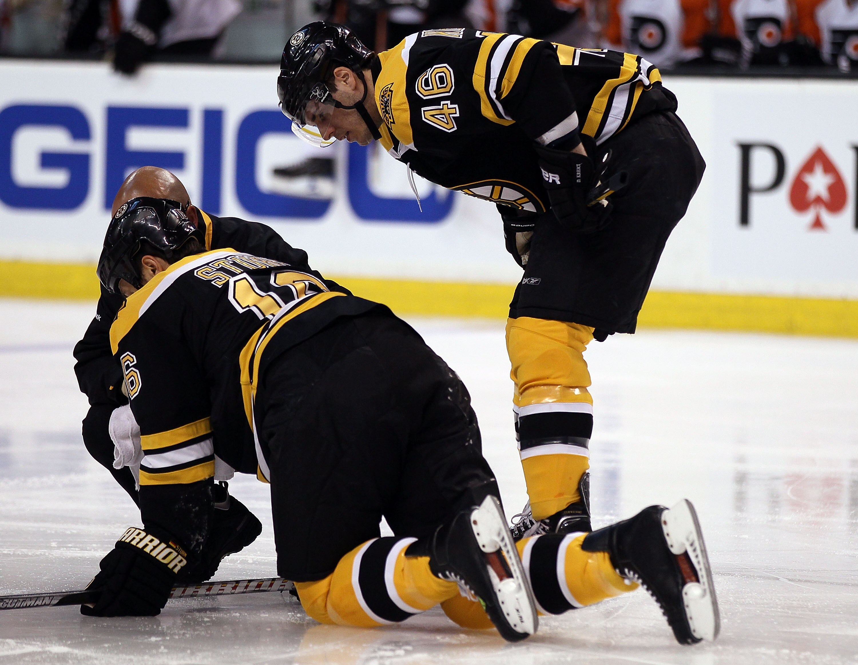 BOSTON - MAY 01:  David Krejci #46 of the Boston Bruins watches as teammate Marco Sturm #16 is attended to after a hit in the first period agianst the Philadelphia Flyers in Game One of the Eastern Conference Semifinals during the 2010 NHL Stanley Cup Pla