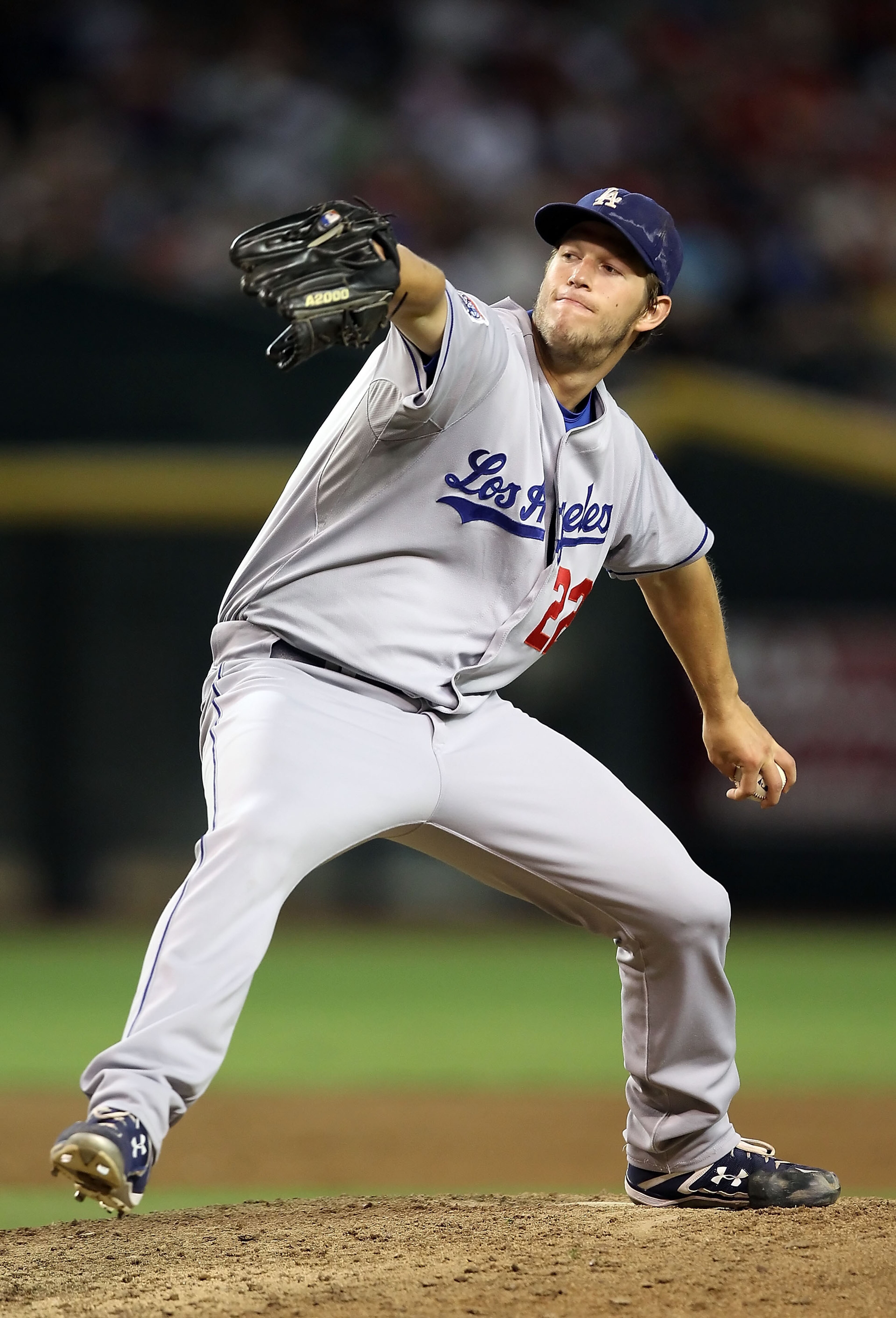 PHOENIX - SEPTEMBER 24:  Starting pitcher Clayton Kershaw #22 of the Los Angeles Dodgers pitches against the Arizona Diamondbacks during the Major League Baseball game at Chase Field on September 24, 2010 in Phoenix, Arizona.  (Photo by Christian Petersen