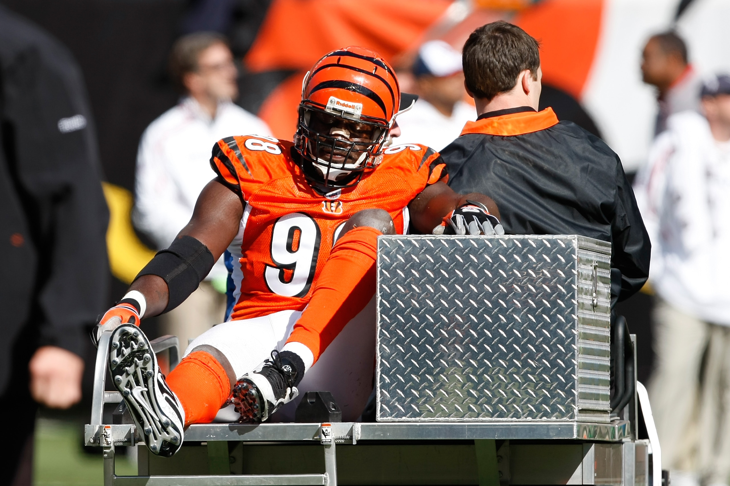 CINCINNATI, OH - OCTOBER 18: Defensive end Antwan Odem #98 of the Cincinnati Bengals is taken off the field on a cart after an injury against the Houston Texans at Paul Brown Stadium on October 18, 2009 in Cincinnati, Ohio. (Photo by Scott Boehm/Getty Ima CINCINNATI, OH - OCTOBER 18: Defensive end Antwan Odem #98 of the Cincinnati Bengals is taken off the field on a cart after an injury against the Houston Texans at Paul Brown Stadium on October 18, 2009 in Cincinnati, Ohio. (Photo by Scott Boehm/Getty Ima