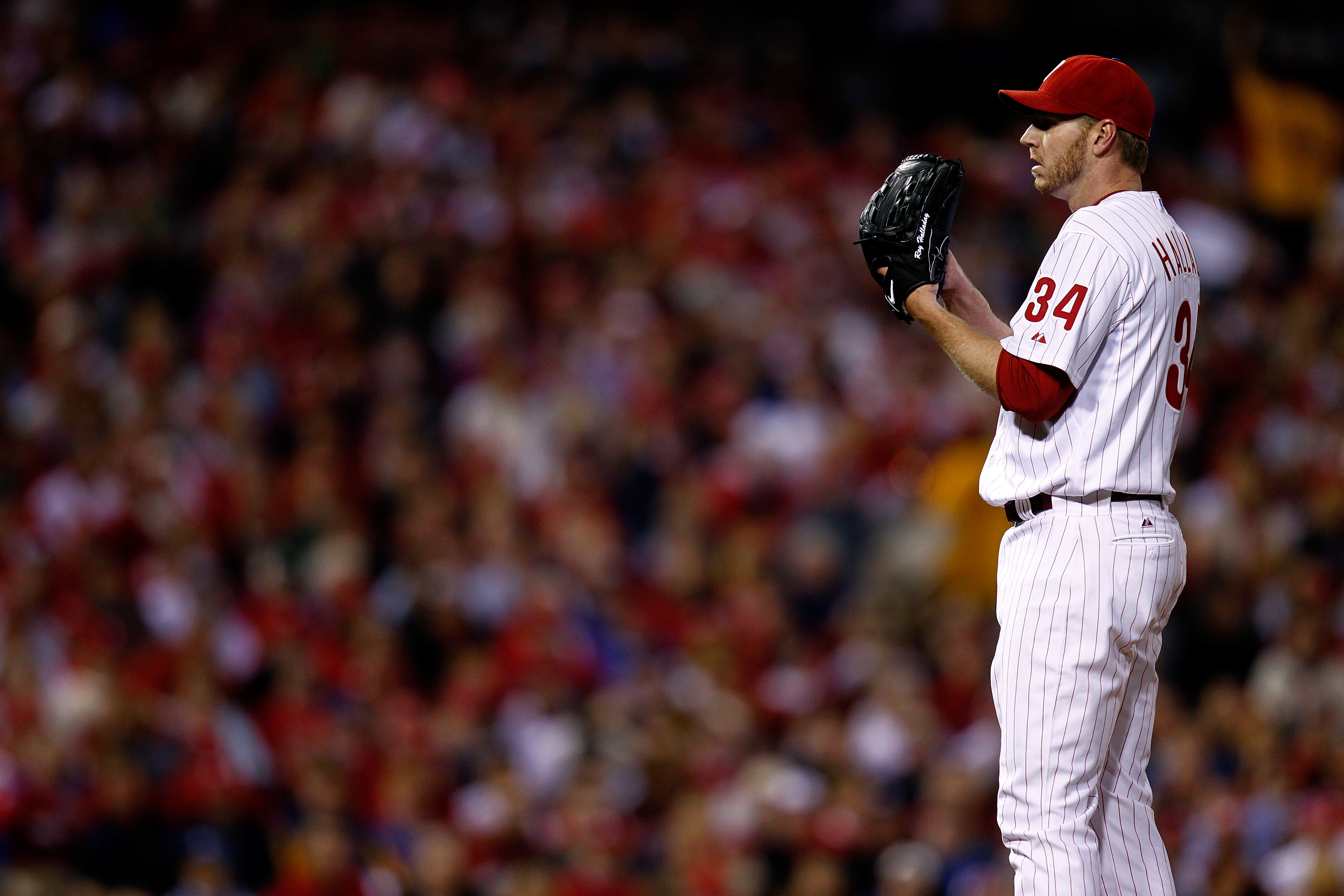PHILADELPHIA - OCTOBER 16:  Roy Halladay #34 of the Philadelphia Phillies pitches in the first inning against the San Francisco Giants in Game One of the NLCS during the 2010 MLB Playoffs at Citizens Bank Park on October 16, 2010 in Philadelphia, Pennsylv