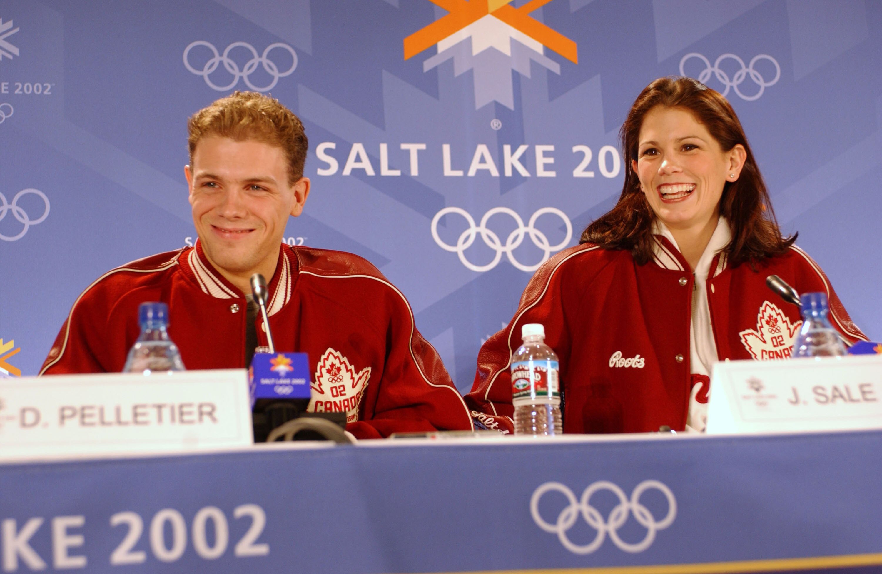 401139 08: (NEWSWEEK, U.S. NEWS, MACLEANS, ITALY AND GERMANY OUT) Canadian pairs figure skaters Jamie Sale (R) and David Pelletier speak to the news media at the Main Media Center during the 2002 Salt Lake Winter Olympics February 15, 2002 in Salt Lake Ci