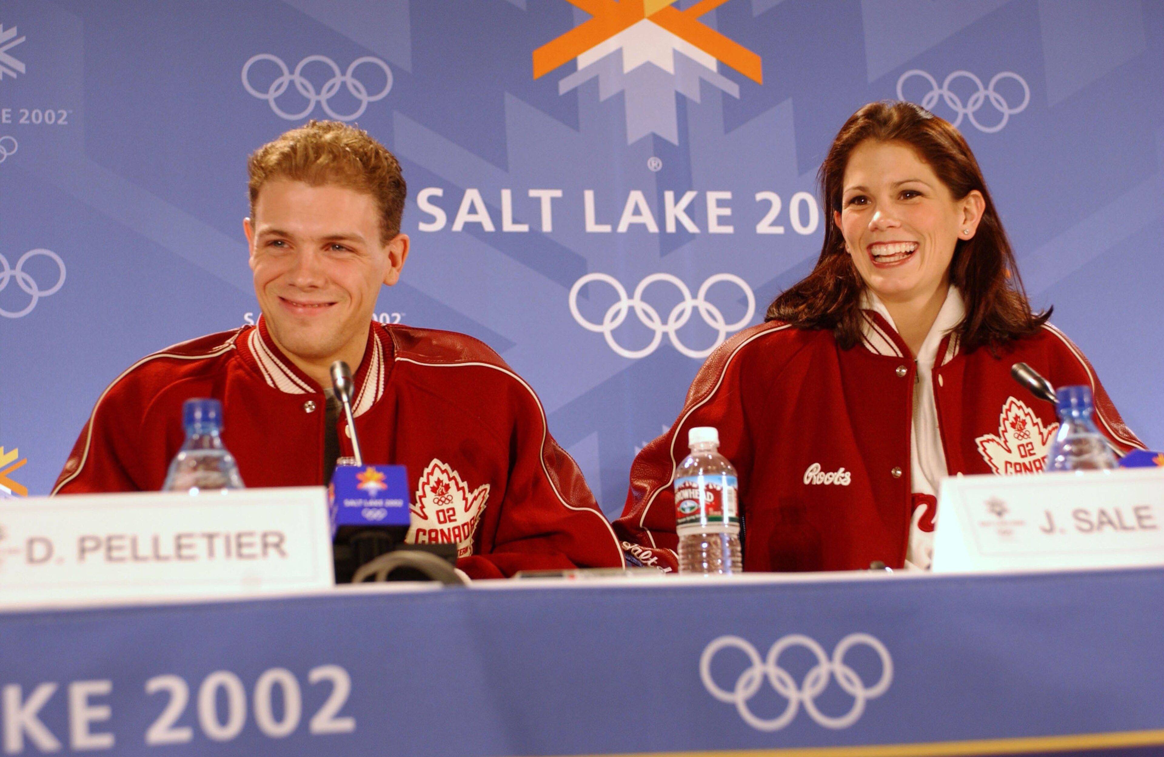 401139 08: (NEWSWEEK, U.S. NEWS, MACLEANS, ITALY AND GERMANY OUT) Canadian pairs figure skaters Jamie Sale (R) and David Pelletier speak to the news media at the Main Media Center during the 2002 Salt Lake Winter Olympics February 15, 2002 in Salt Lake Ci