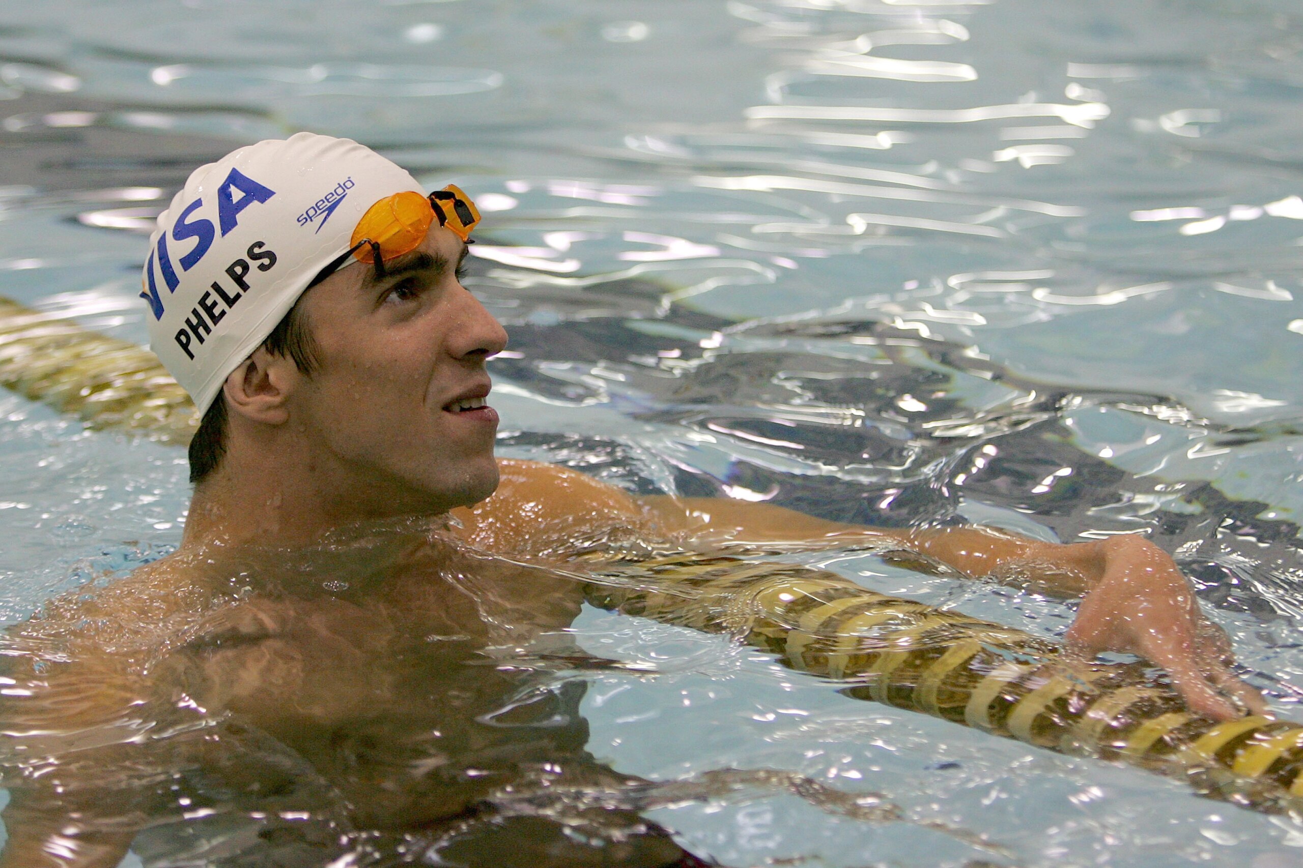 NEW YORK - AUGUST 28:  Michael Phelps, a 14-time Olympic gold medalist, returns to the United States and partners with Visa to help introduce NYC children to swimming at the YMCA of Greater New York on August 28, 2008 in New York City.  (Photo by Chris Tr