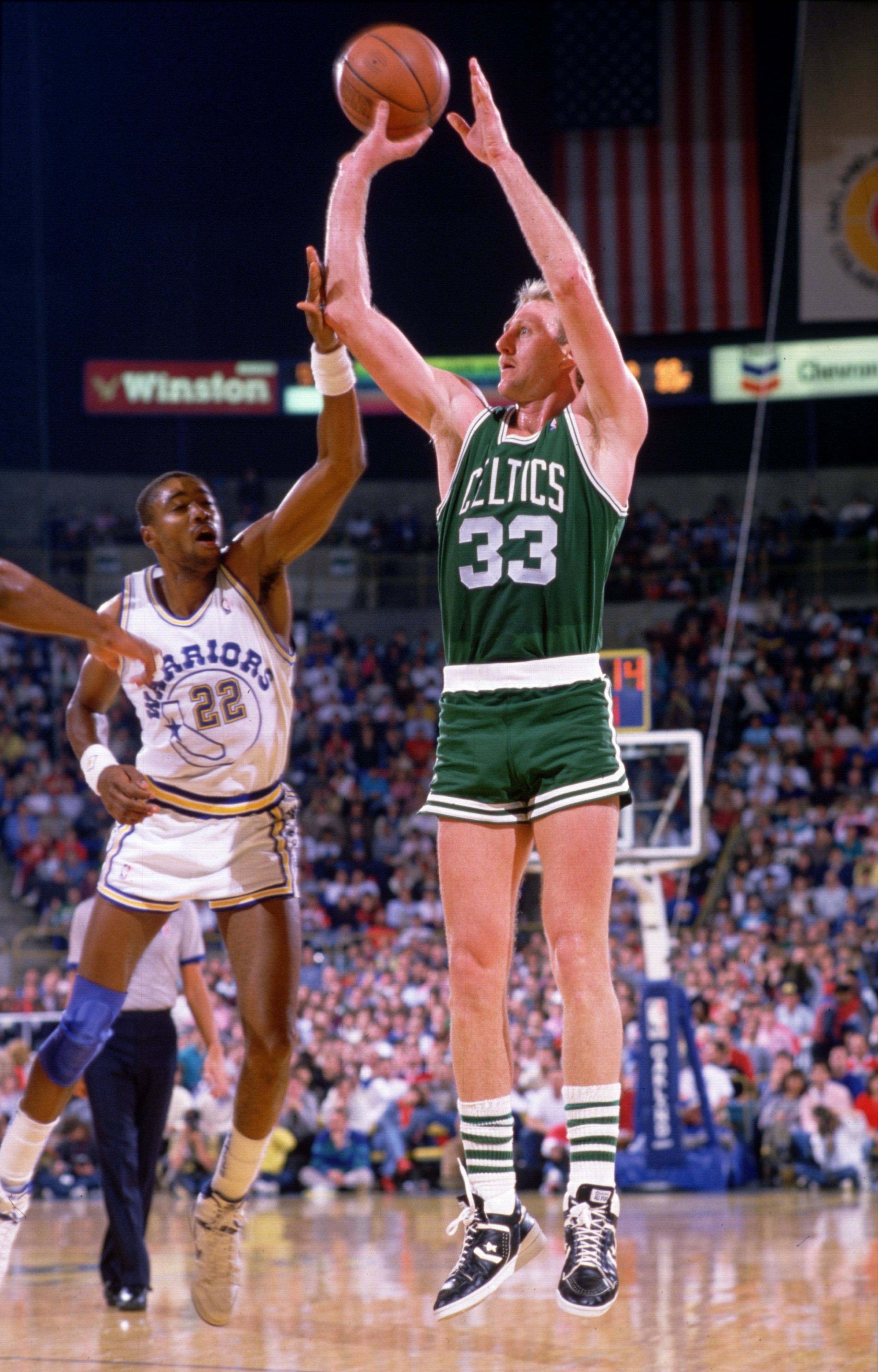 UNDATED:  BOSTON FORWARD LARRY BIRD SHOOTS A JUMP SHOT AND IS FOULED DURING THE CELTICS GAME VERSUS THE GOLDEN STATE WARRIORS AT OAKLAND COLISEUM IN OAKLAND, CALIFORNIA. Mandatory Credit: Stephen Dunn/ALLSPORT