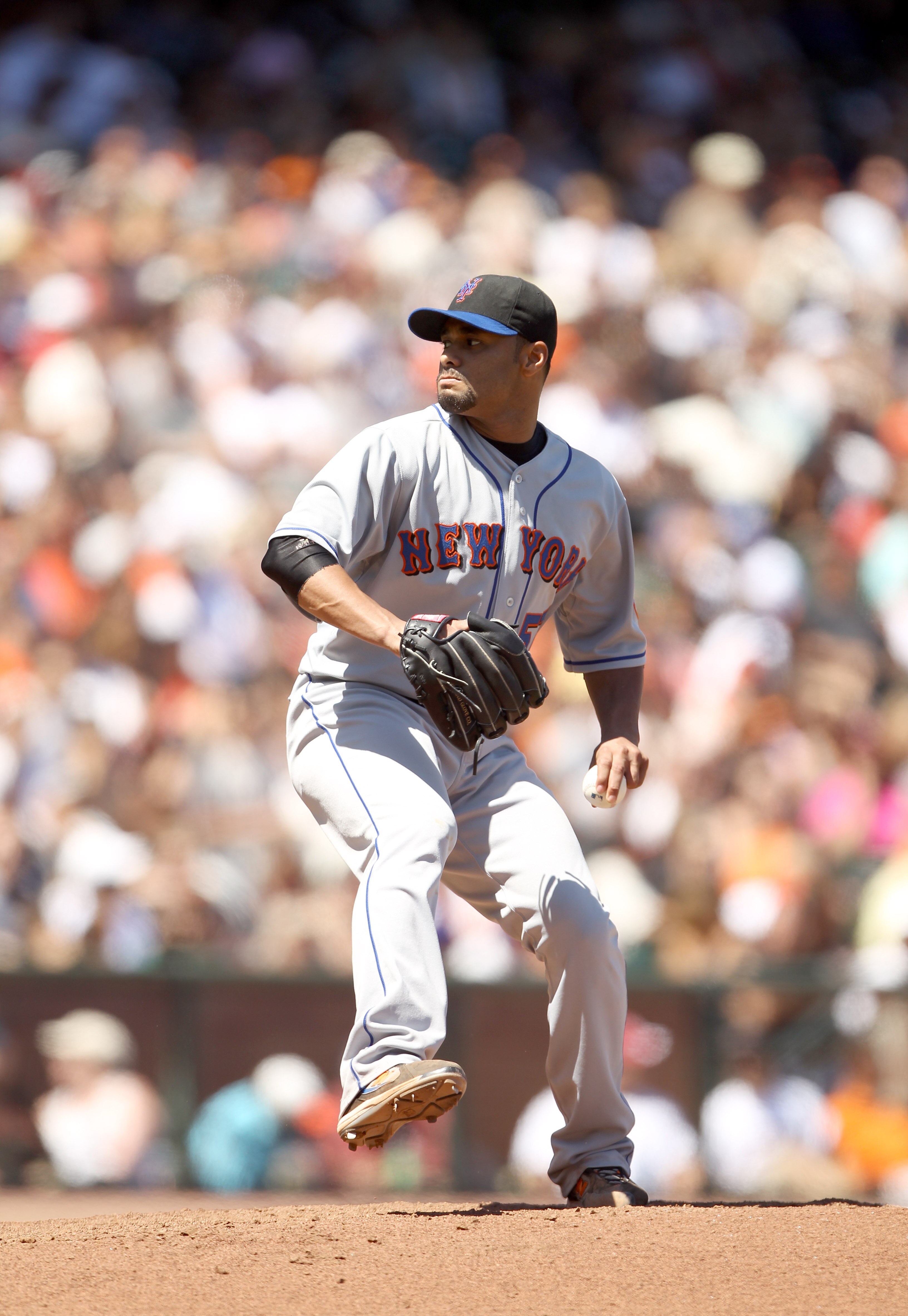 SAN FRANCISCO - JULY 18:  Johan Santana #57 of the New York Mets pitches against the San Francisco Giants at AT&T Park on July 18, 2010 in San Francisco, California.  (Photo by Ezra Shaw/Getty Images)