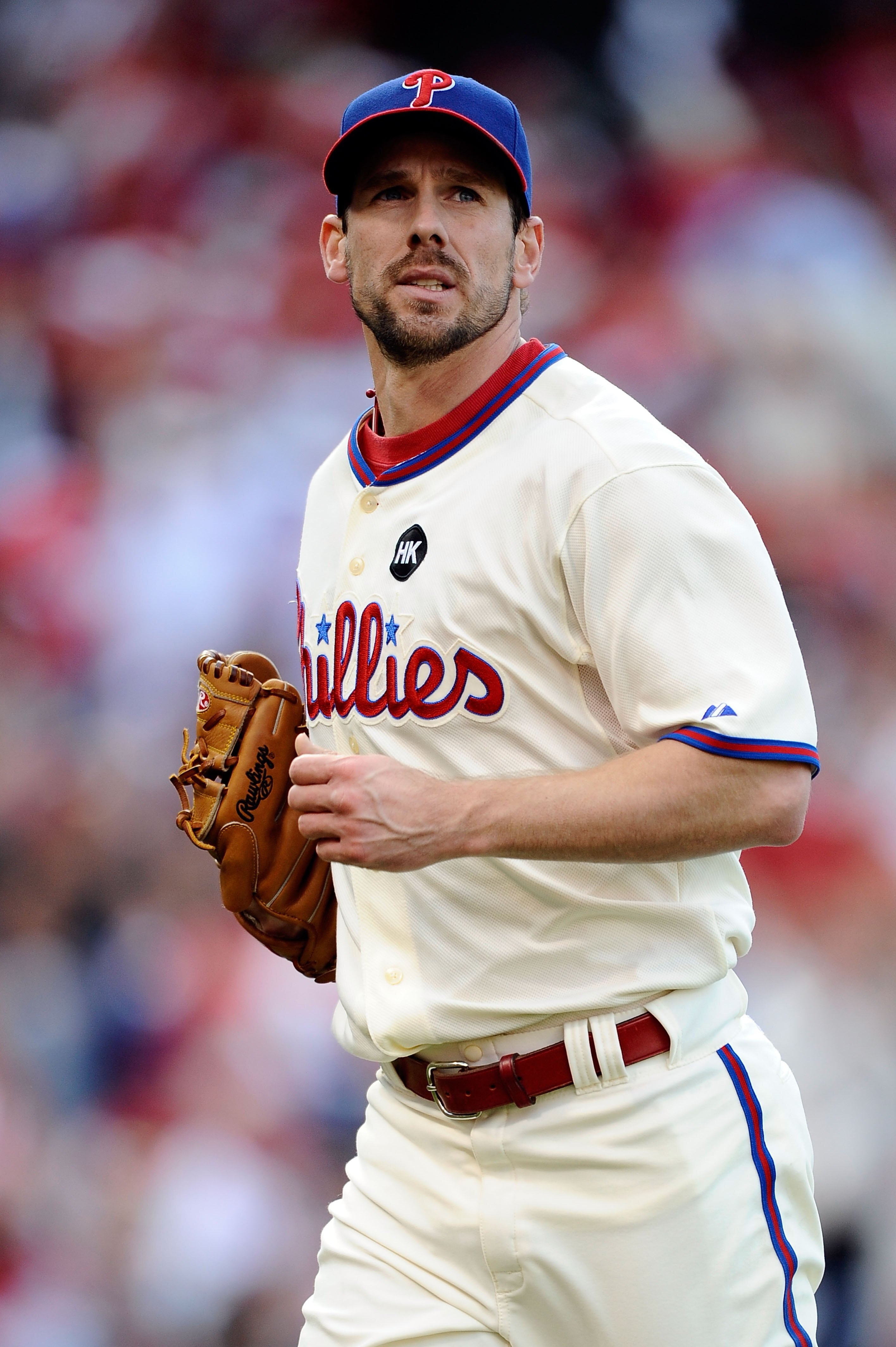 PHILADELPHIA - OCTOBER 07:  Cliff Lee #34 of the Philadelphia Phillies returns to the dugout against the Colorado Rockies in Game One of the NLDS during the 2009 MLB Playoffs at Citizens Bank Park on October 7, 2009 in Philadelphia, Pennsylvania. The Phil