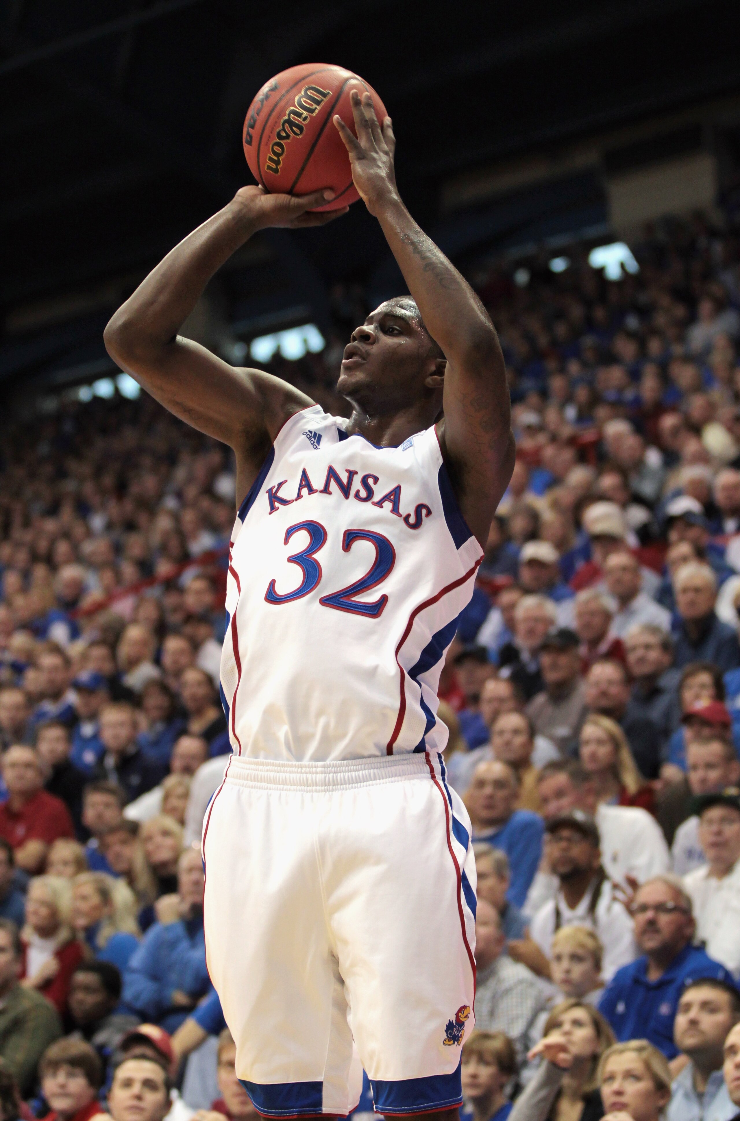 LAWRENCE, KS - DECEMBER 18: Josh Selby #32 of the Kansas Jayhawks shoots during the game against the USC Trojans on December 18, 2010 at Allen Fieldhouse in Lawrence, Kansas. (Photo by Jamie Squire/Getty Images) LAWRENCE, KS - DECEMBER 18: Josh Selby #32 of the Kansas Jayhawks shoots during the game against the USC Trojans on December 18, 2010 at Allen Fieldhouse in Lawrence, Kansas. (Photo by Jamie Squire/Getty Images)