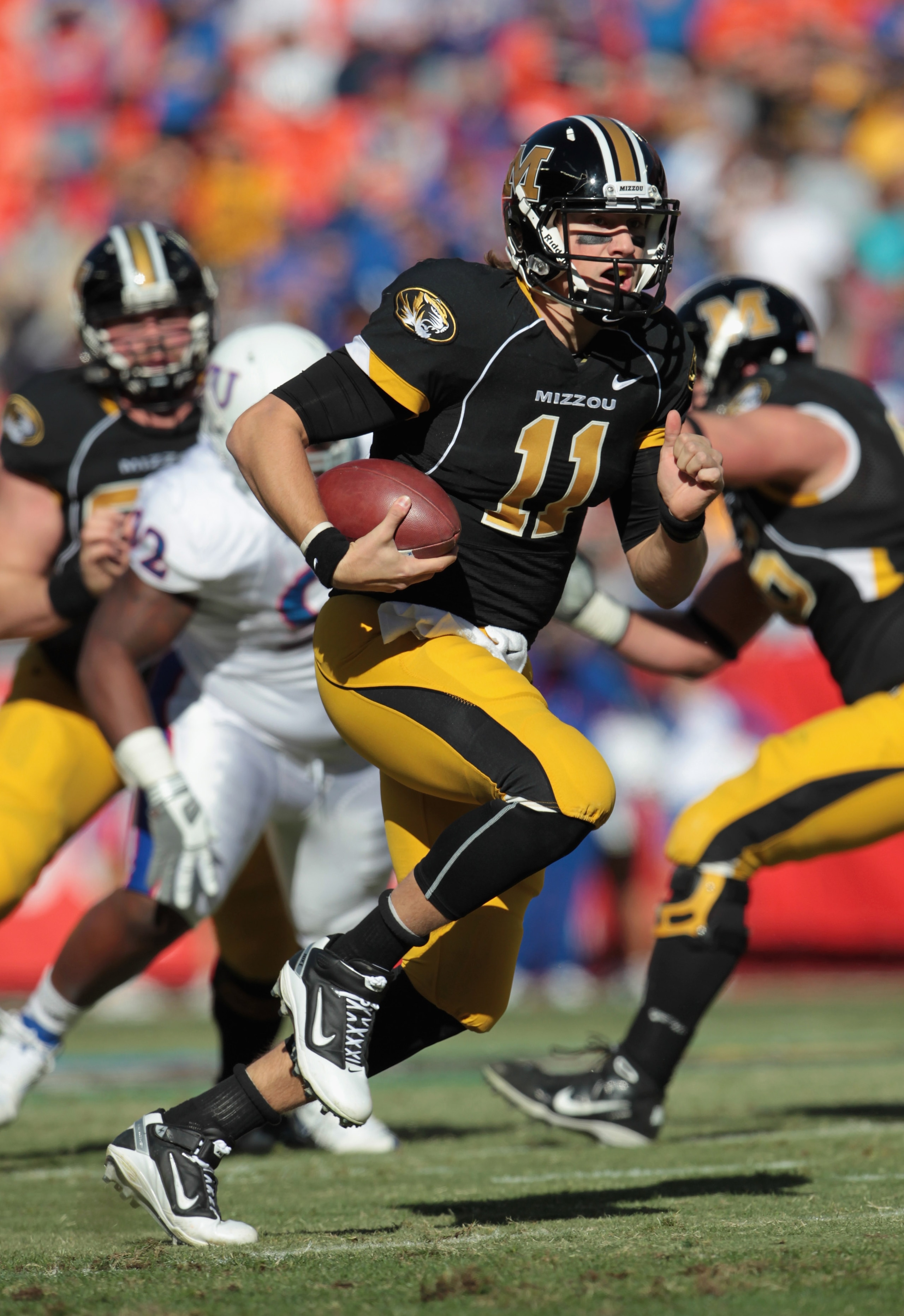 KANSAS CITY, MO - NOVEMBER 27: Quarterback Blaine Gabbert #11 of the Missouri Tigers carries the ball during the game against the Kansas Jayhawks on November 27, 2010 at Arrowhead Stadium in Kansas City, Missouri. (Photo by Jamie Squire/Getty Images) KANSAS CITY, MO - NOVEMBER 27: Quarterback Blaine Gabbert #11 of the Missouri Tigers carries the ball during the game against the Kansas Jayhawks on November 27, 2010 at Arrowhead Stadium in Kansas City, Missouri. (Photo by Jamie Squire/Getty Images)