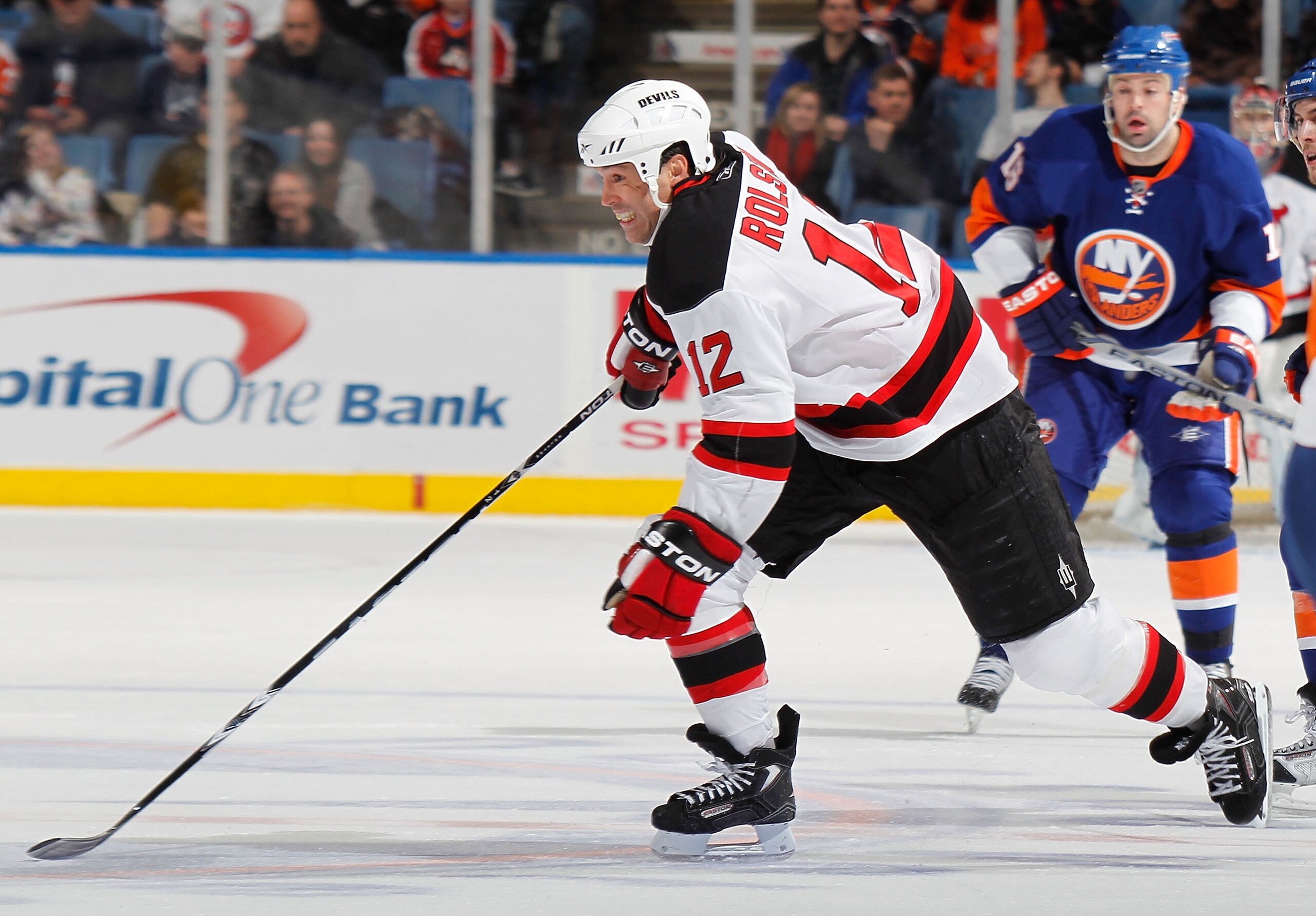 UNIONDALE, NY - MARCH 13:  Brian Rolston #12 of the New Jersey Devils skates against the New York Islanders in an NHL game at the Nassau Coliseum on March 13, 2010 in Uniondale, New York.  (Photo by Paul Bereswill/Getty Images)