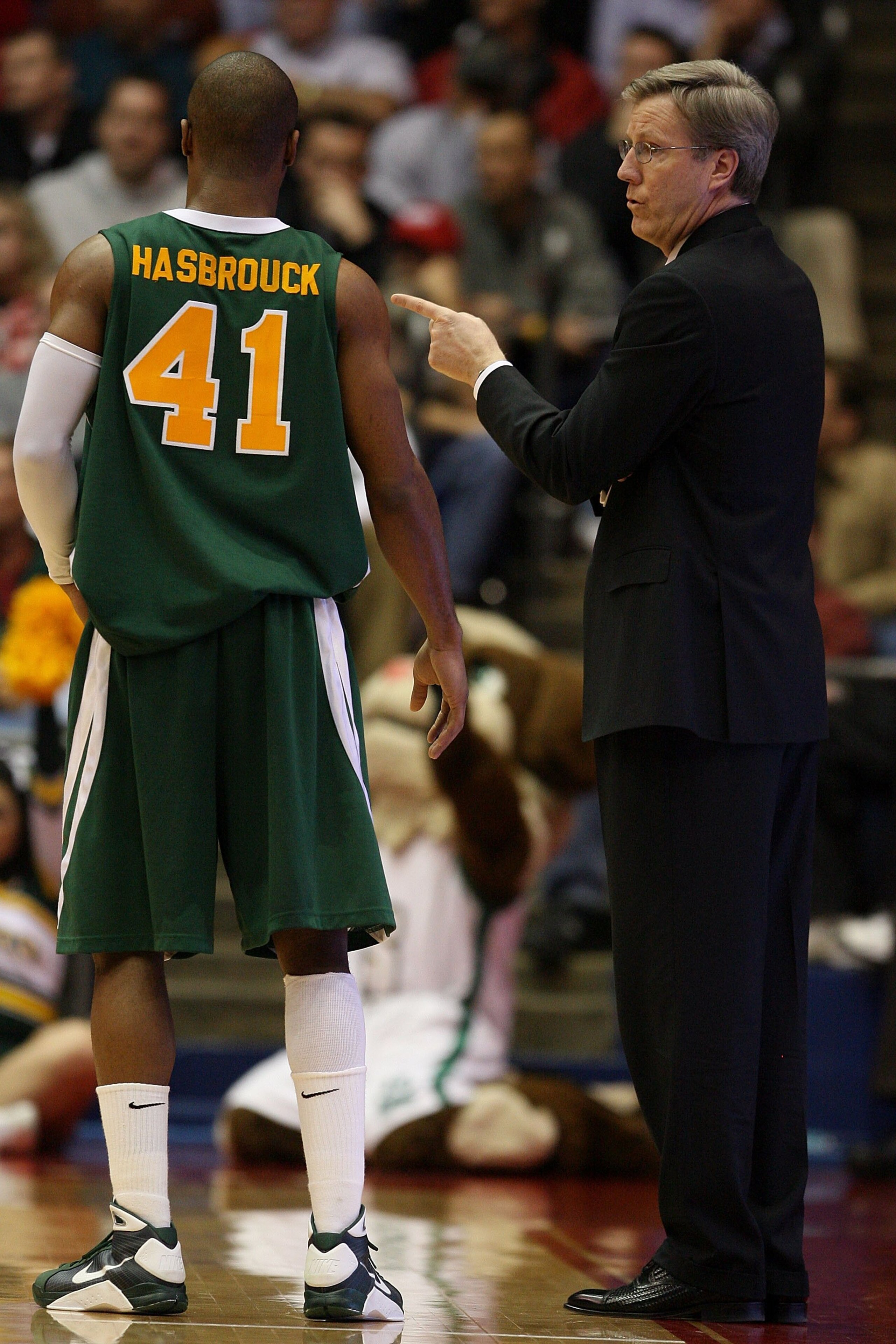 DAYTON, OH - MARCH 20: Head coach Fran McCaffery of the Siena Saints speaks to Kenny Hasbrouck #41 on the sidelines during a game against the Ohio State Buckeyes during the first round of the NCAA Division I Men's Basketball Tournament at the University DAYTON, OH - MARCH 20: Head coach Fran McCaffery of the Siena Saints speaks to Kenny Hasbrouck #41 on the sidelines during a game against the Ohio State Buckeyes during the first round of the NCAA Division I Men's Basketball Tournament at the University