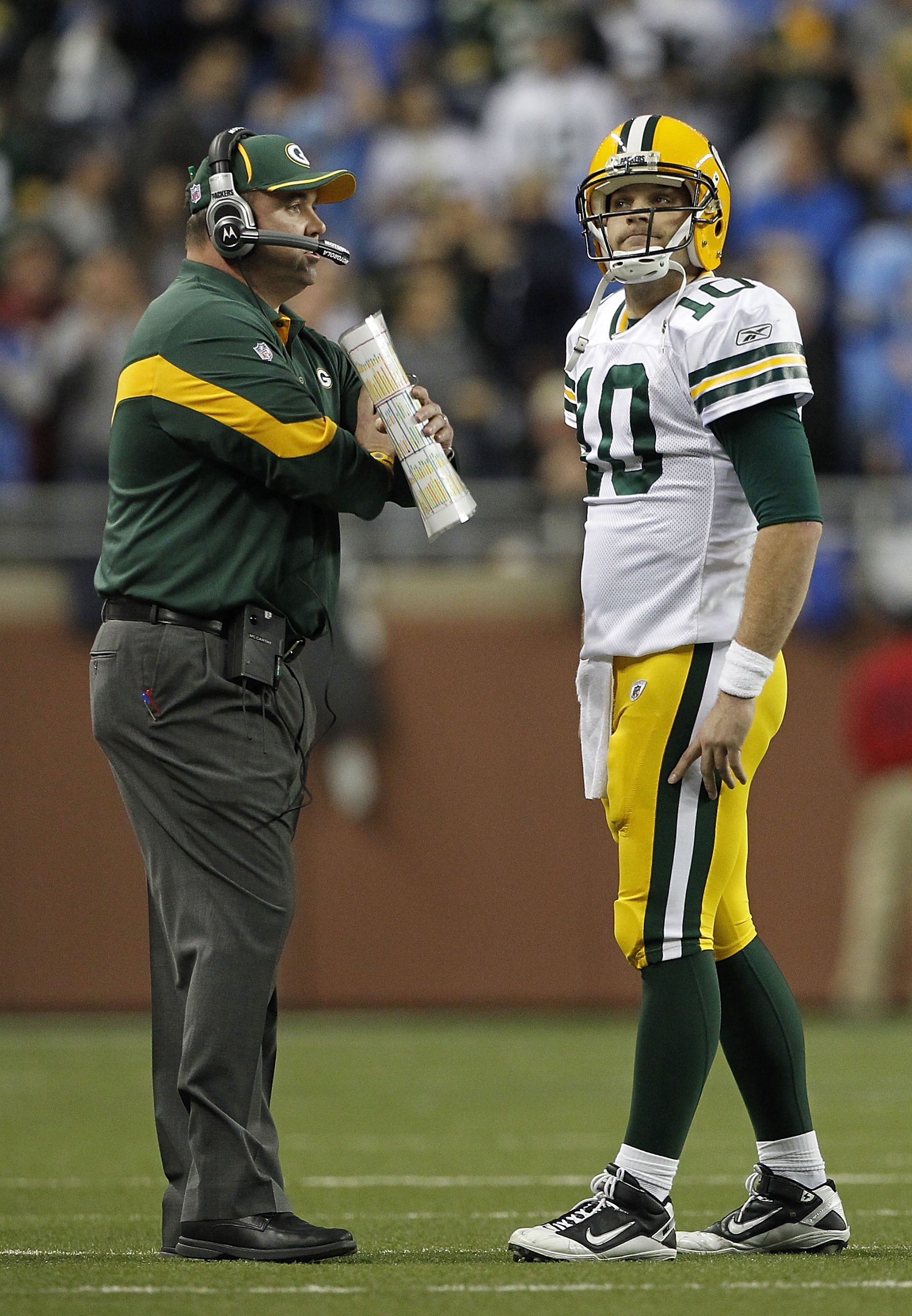 DETROIT - DECEMBER 12: Green Bay Packers head coach Mike McCarthy talks with Matt Flynn #10 after the Packers failed to convert a first down late in the game against the Detroit Lions at Ford Field on December 12, 2010 in Detroit, Michigan. The Lions defe