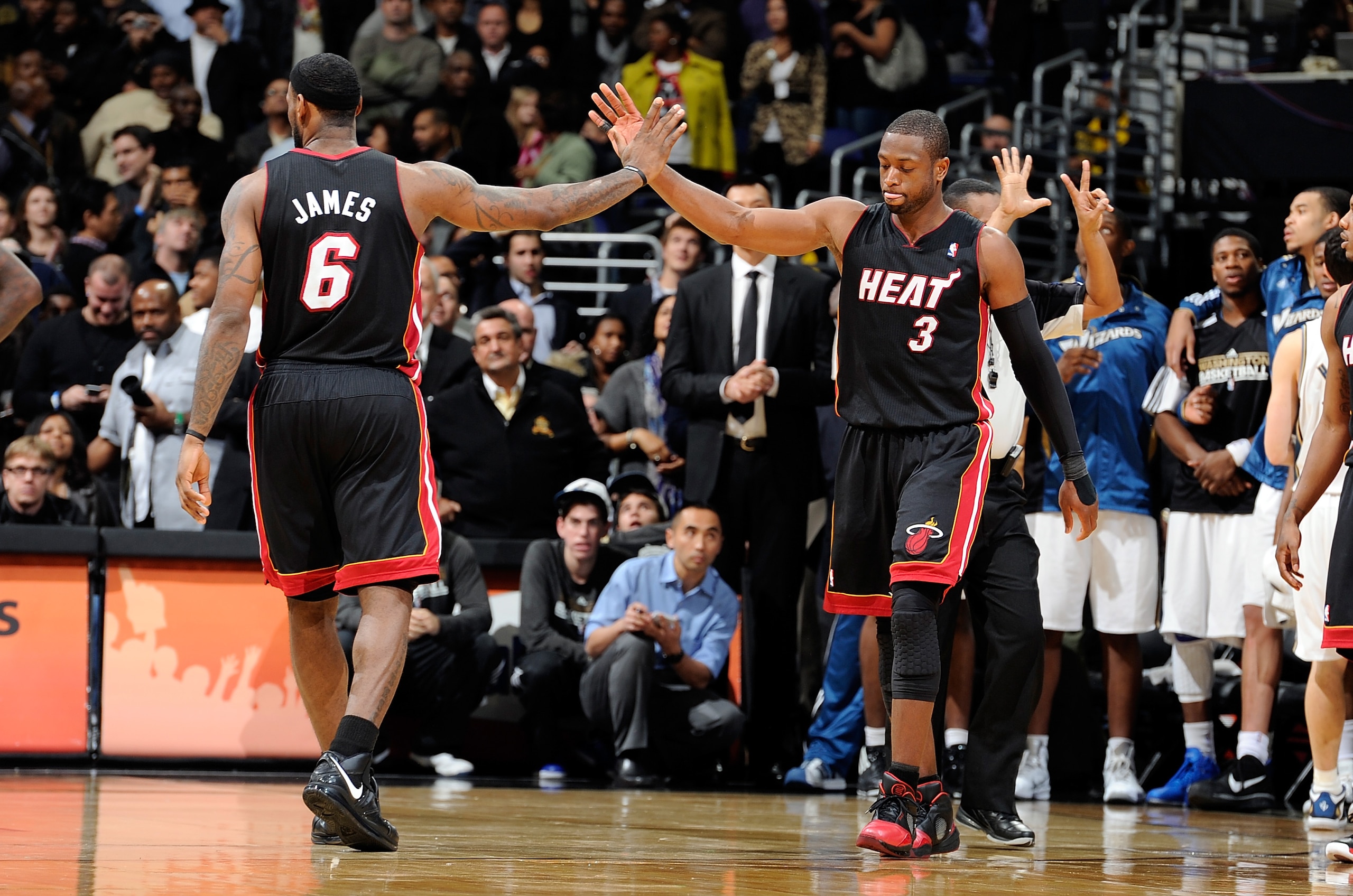WASHINGTON - DECEMBER 18: LeBron James #6 congratulates Dwyane Wade #3 after drawing a foul in the fourth quarter against the Washington Wizards at the Verizon Center on December 18, 2010 in Washington, DC. NOTE TO USER: User expressly acknowledges and a WASHINGTON - DECEMBER 18: LeBron James #6 congratulates Dwyane Wade #3 after drawing a foul in the fourth quarter against the Washington Wizards at the Verizon Center on December 18, 2010 in Washington, DC. NOTE TO USER: User expressly acknowledges and a