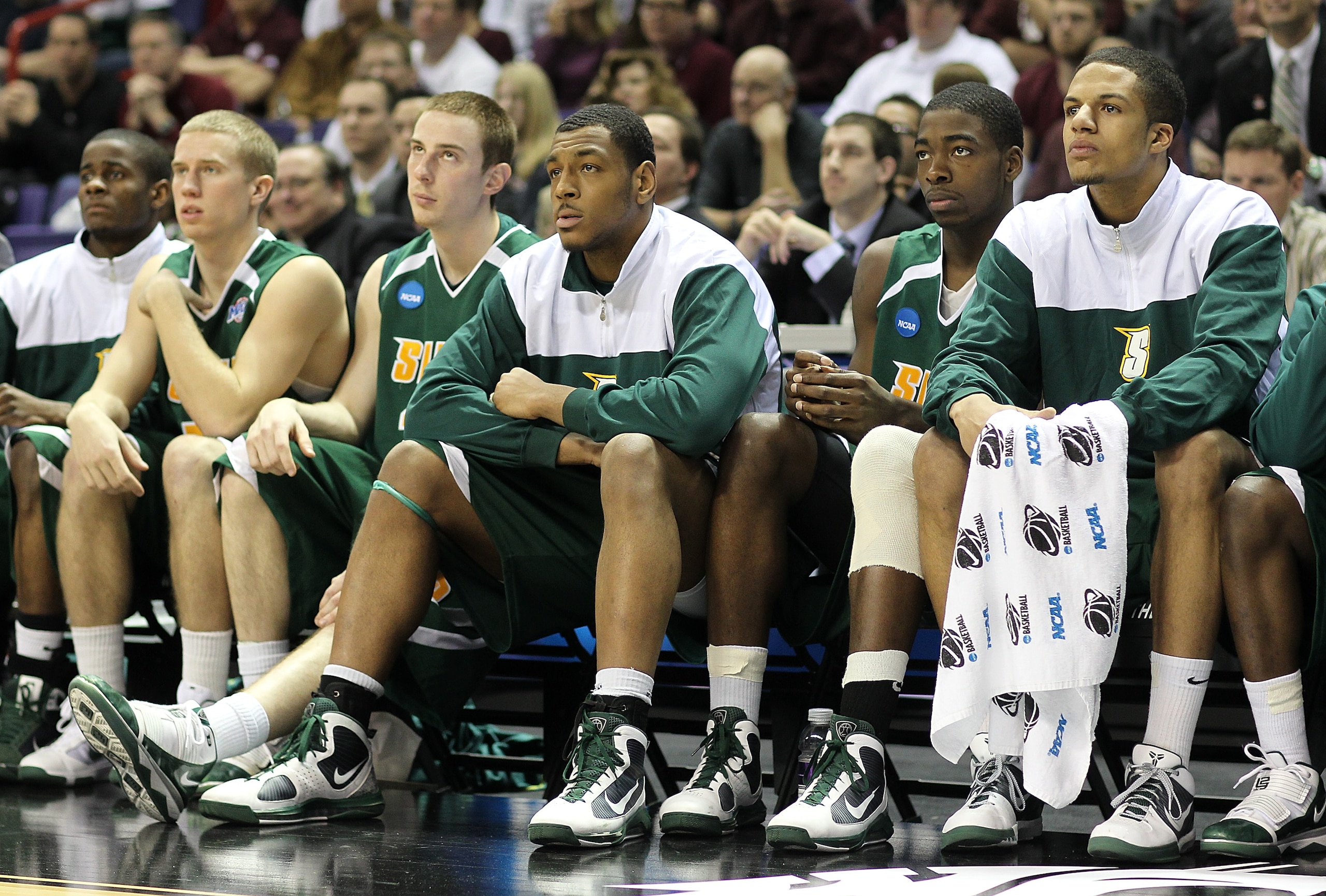 SPOKANE - MARCH 19: Members of the Siena Saints watch the final seconds tick off the clock in a 72-64 loss against the Purdue Boilermakers during the first round of the 2010 NCAA men's basketball tournament at the Spokane Arena on March 19, 2010 in Spoka SPOKANE - MARCH 19: Members of the Siena Saints watch the final seconds tick off the clock in a 72-64 loss against the Purdue Boilermakers during the first round of the 2010 NCAA men's basketball tournament at the Spokane Arena on March 19, 2010 in Spoka