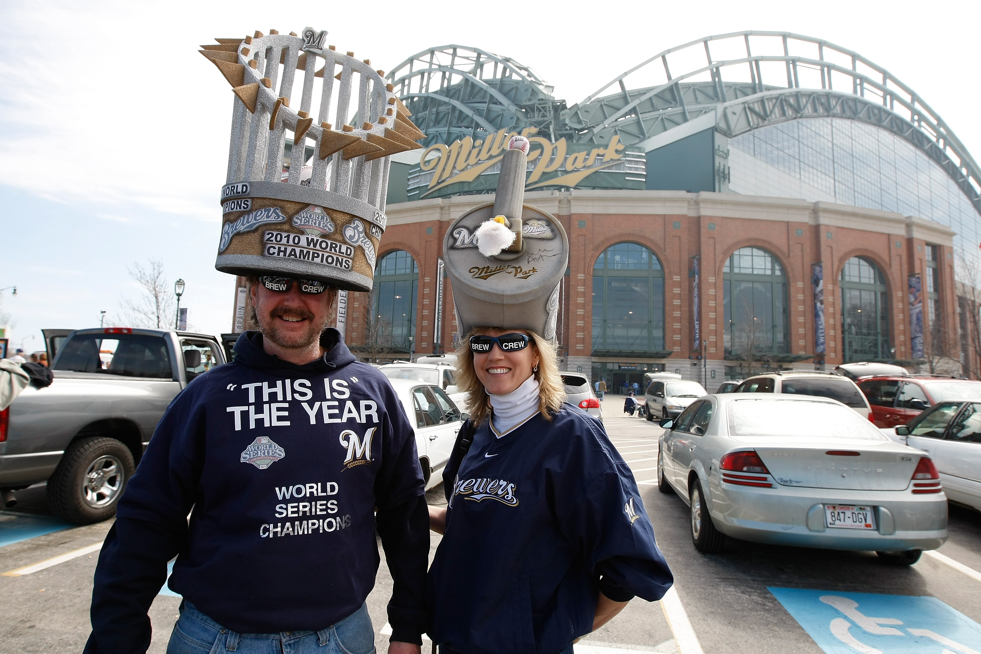 MILWAUKEE, WI - APRIL 05: Brewers fans pose for a picture as they tailgate outside of Miller Park prior to the game between the Colorado Rockies and the Milwaukee Brewers at Miller Park on April 5, 2010 in Milwaukee, Wisconsin. (Photo by Scott Boehm/Getty