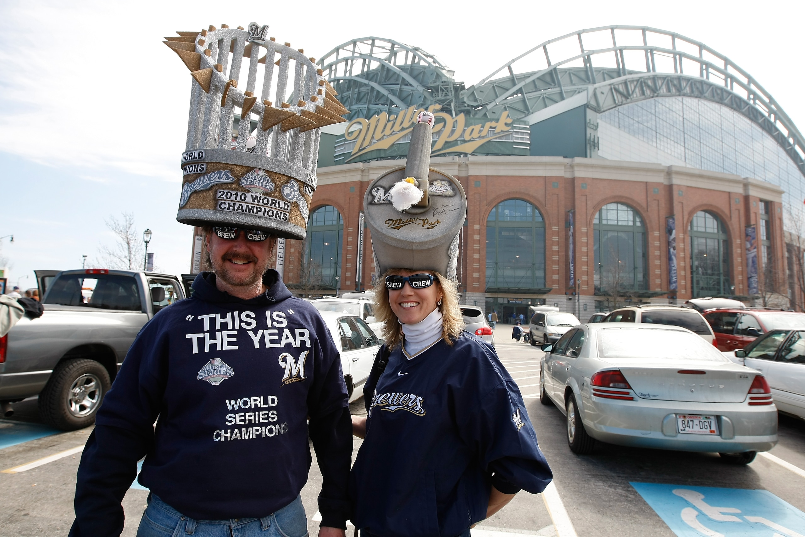 MILWAUKEE, WI - APRIL 05: Brewers fans pose for a picture as they tailgate outside of Miller Park prior to the game between the Colorado Rockies and the Milwaukee Brewers at Miller Park on April 5, 2010 in Milwaukee, Wisconsin. (Photo by Scott Boehm/Getty