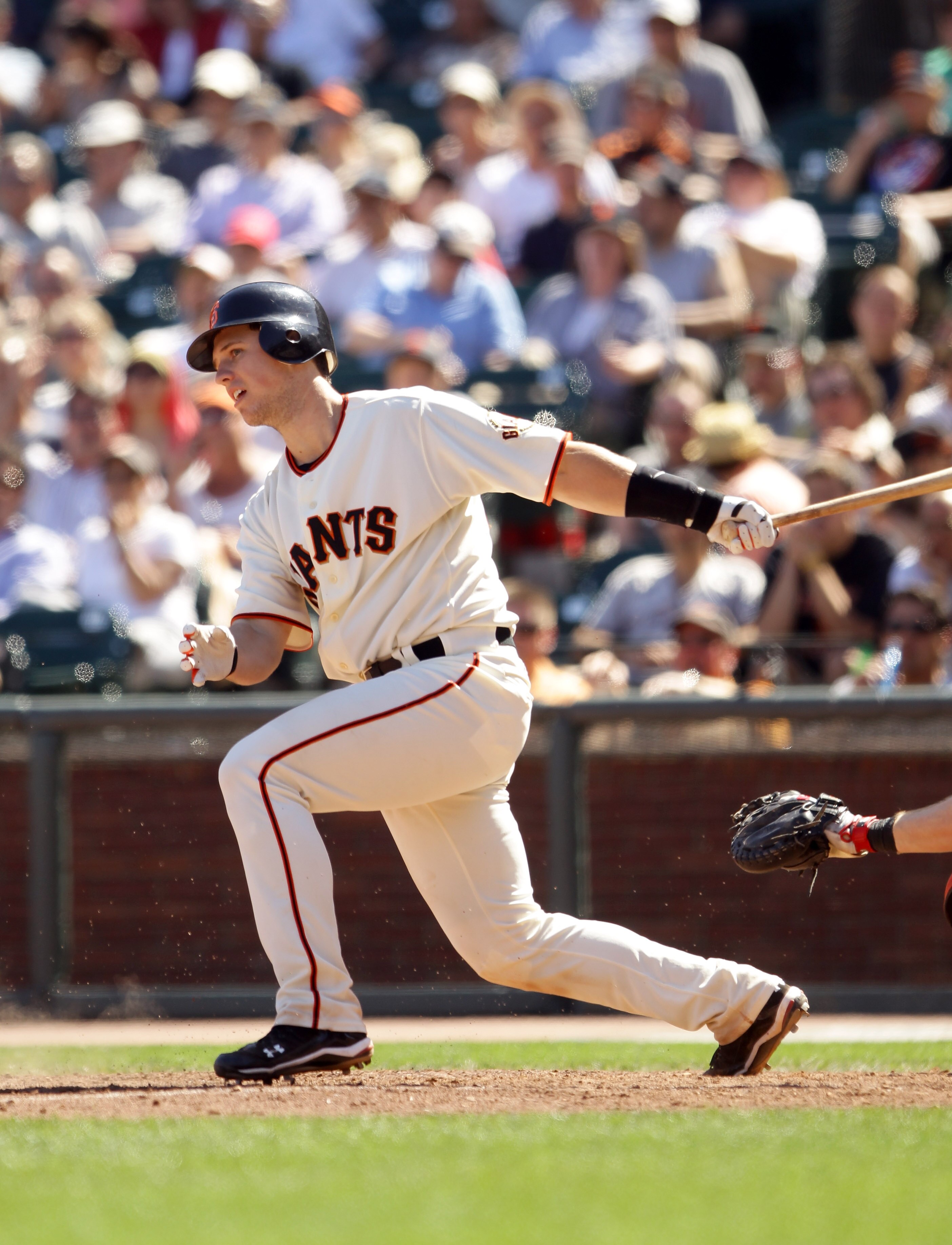 SAN FRANCISCO - AUGUST 25:  Buster Posey #28 of the San Francisco Giants bats against the Cincinnati Reds at AT&T Park on August 25, 2010 in San Francisco, California.  (Photo by Ezra Shaw/Getty Images)