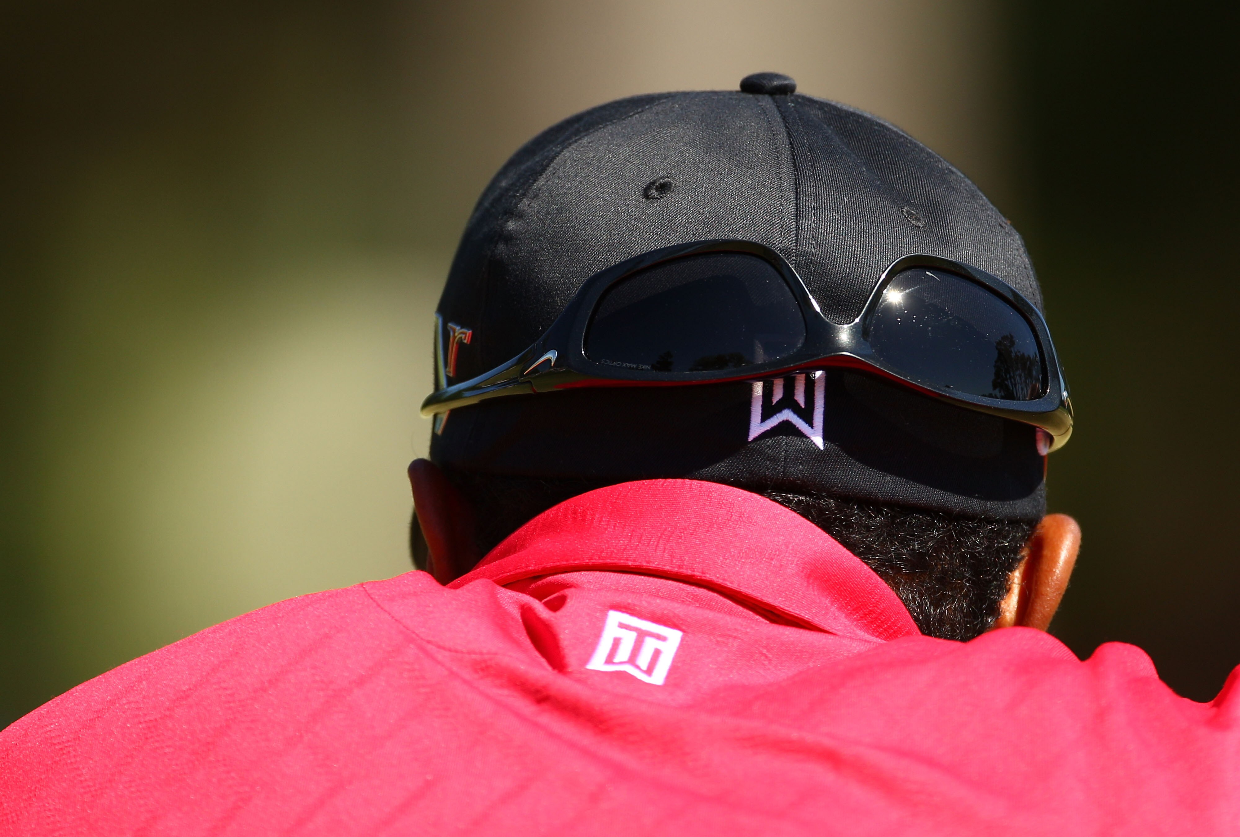 PONTE VEDRA BEACH, FL - MAY 09:  Tiger Woods looks on from the second green during the final round of THE PLAYERS Championship held at THE PLAYERS Stadium course at TPC Sawgrass on May 9, 2010 in Ponte Vedra Beach, Florida.  (Photo by Richard Heathcote/Ge