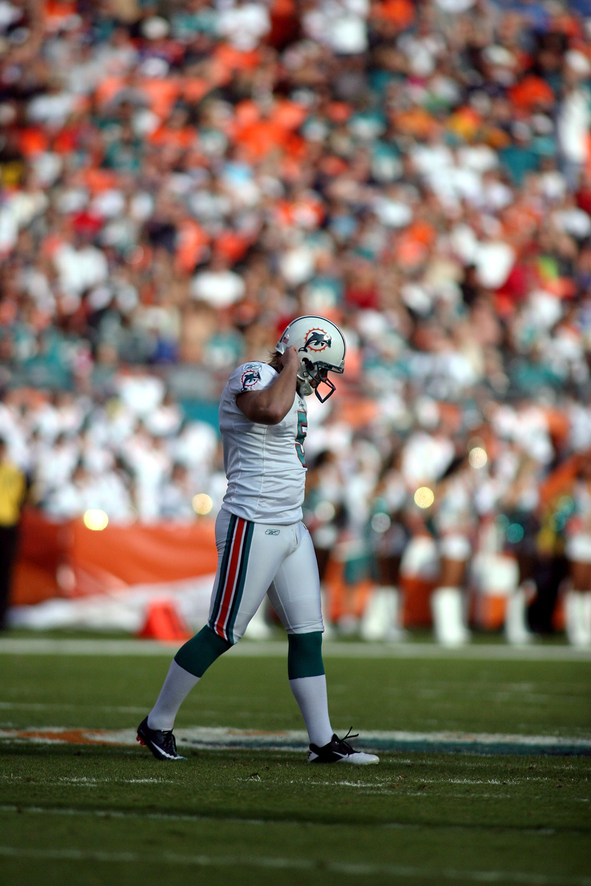 MIAMI, FL - DECEMBER 19: Kicker Dan Carpenter #5 of the Miami Dolphins reacts to missing a field goal late in the game against the Buffalo Bills at Sun Life Stadium on December 19, 2010 in Miami, Florida. The Bills defeated the Dolphins 17-14.  (Photo by