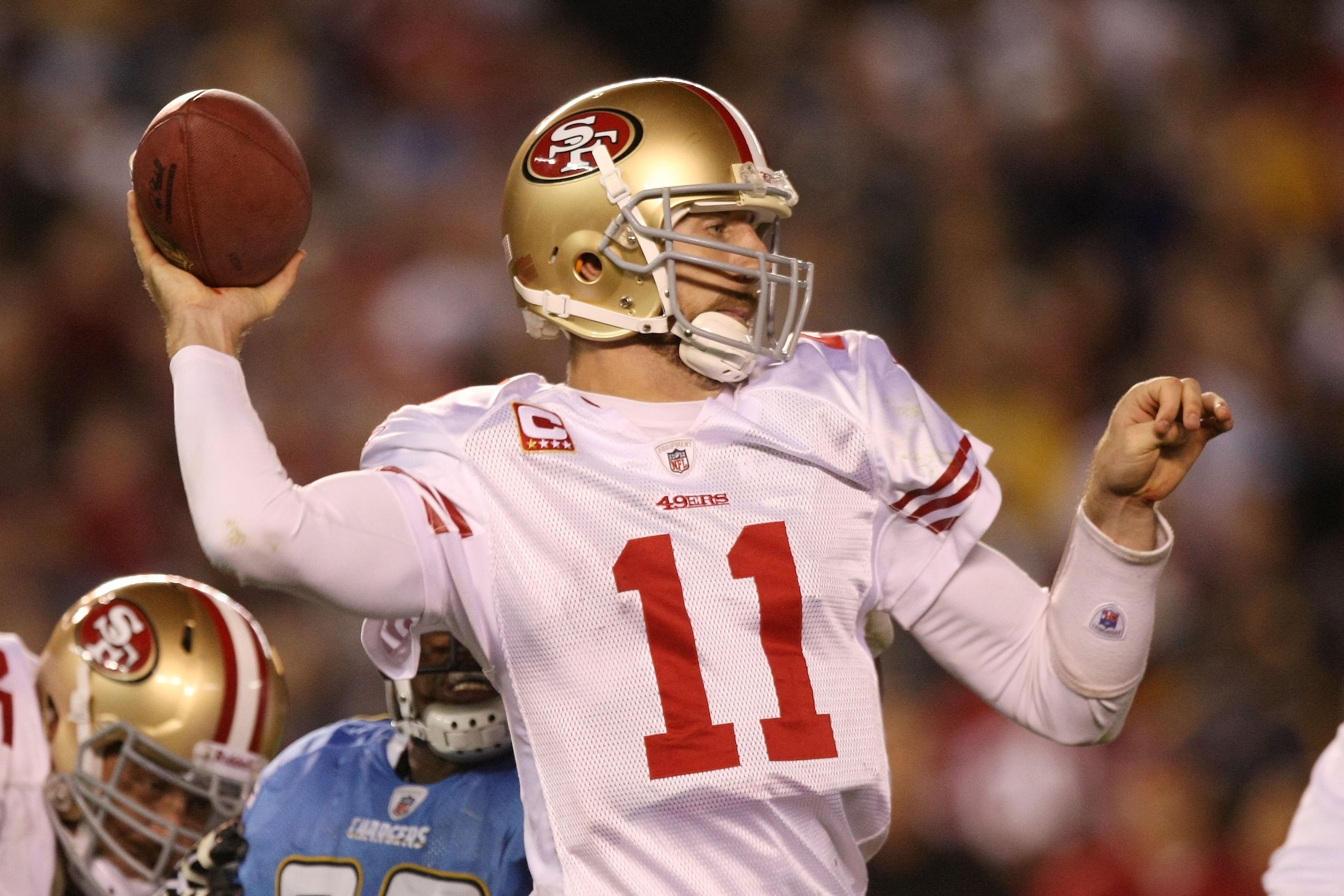 SAN DIEGO, CA - DECEMBER 16:  Quarterback Alex Smith #11 of the San Francisco 49ers drops back to pass against the San Diego Chargers at Qualcomm Stadium on December 16, 2010 in San Diego, California.  (Photo by Donald Miralle/Getty Images)