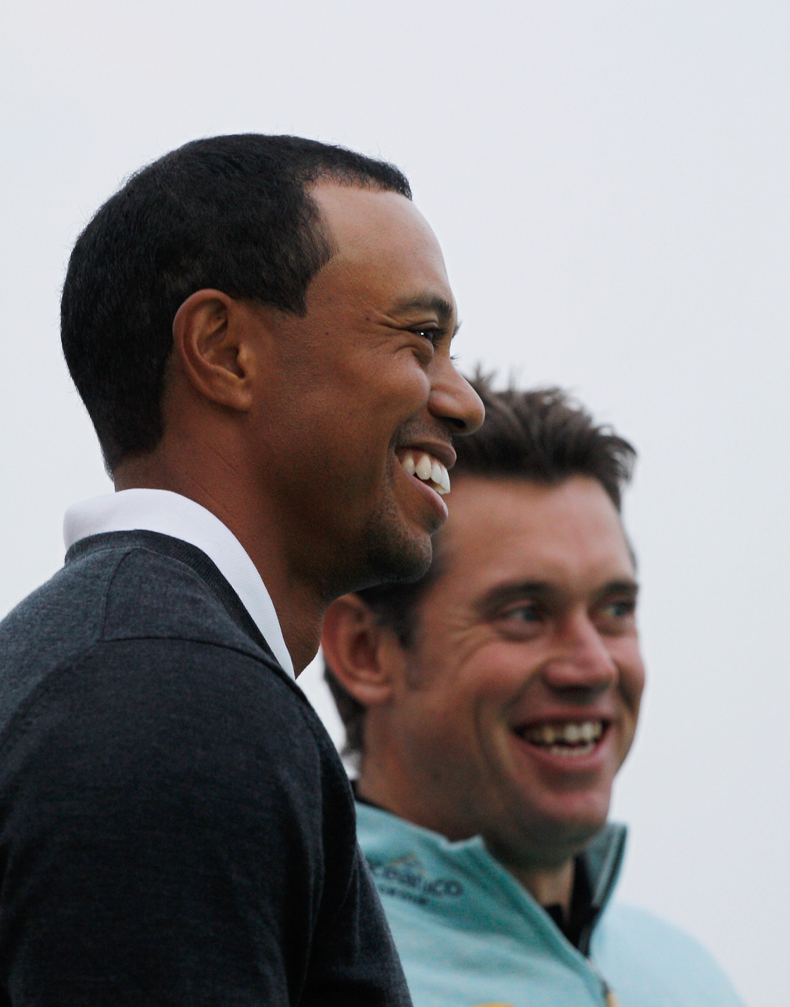 SHANGHAI, CHINA - NOVEMBER 02:  Tiger Woods of the USA (L) and Lee Westwood of England share a joke during the 2010 WGC-HSBC Champions Photocall at The Peninsula hotel on The Bund, Shanghai on November 2, 2010 in Shanghai, China.  (Photo by Scott Halleran