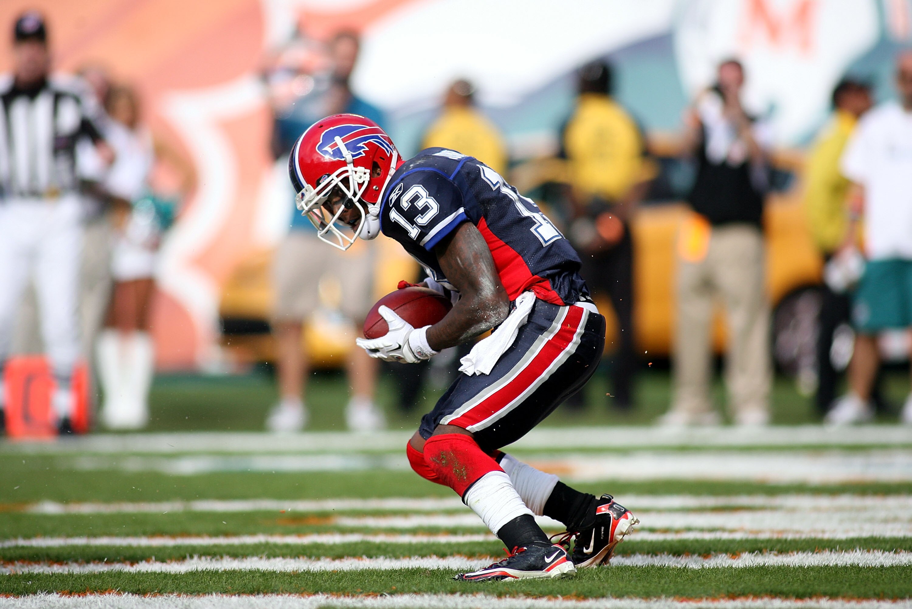 MIAMI, FL - DECEMBER 19:  Receiver Steve Johnson #13 of the Buffalo Bills catches a touchdown pass during a game against the Miami Dolphins at Sun Life Stadium on December 19, 2010 in Miami, Florida.The Bills defeated the Dolphins 17-14.  (Photo by Marc S
