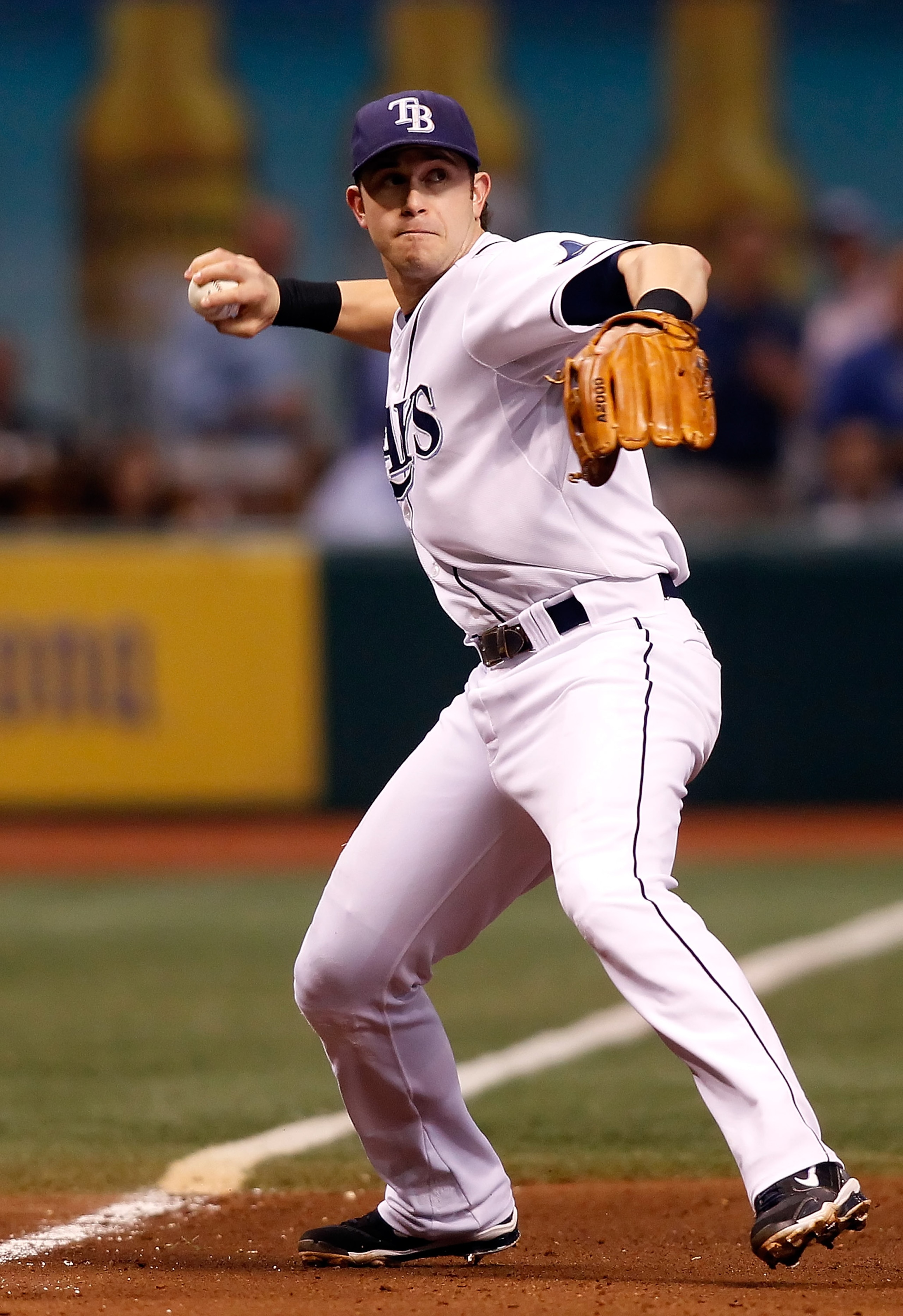 ST. PETERSBURG, FL - AUGUST 31:  Infielder Evan Longoria #3 of the Tampa Bay Rays throws over to first for an out against the Toronto Blue Jays during the game at Tropicana Field on August 31, 2010 in St. Petersburg, Florida.  (Photo by J. Meric/Getty Ima