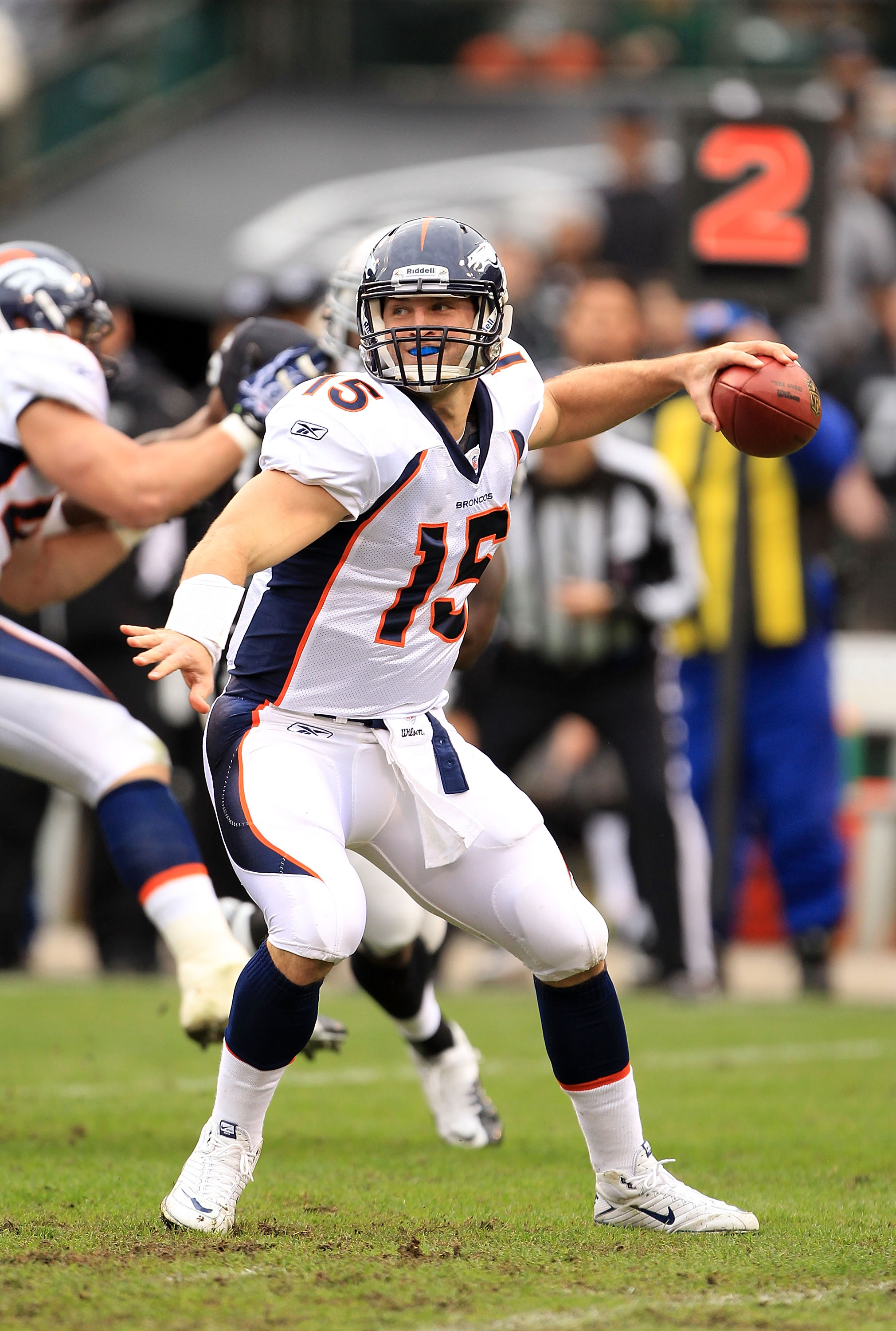 OAKLAND, CA - DECEMBER 19:  Tim Tebow #15 of the Denver Broncos passes the ball against the Oakland Raiders at Oakland-Alameda County Coliseum on December 19, 2010 in Oakland, California.  (Photo by Ezra Shaw/Getty Images)