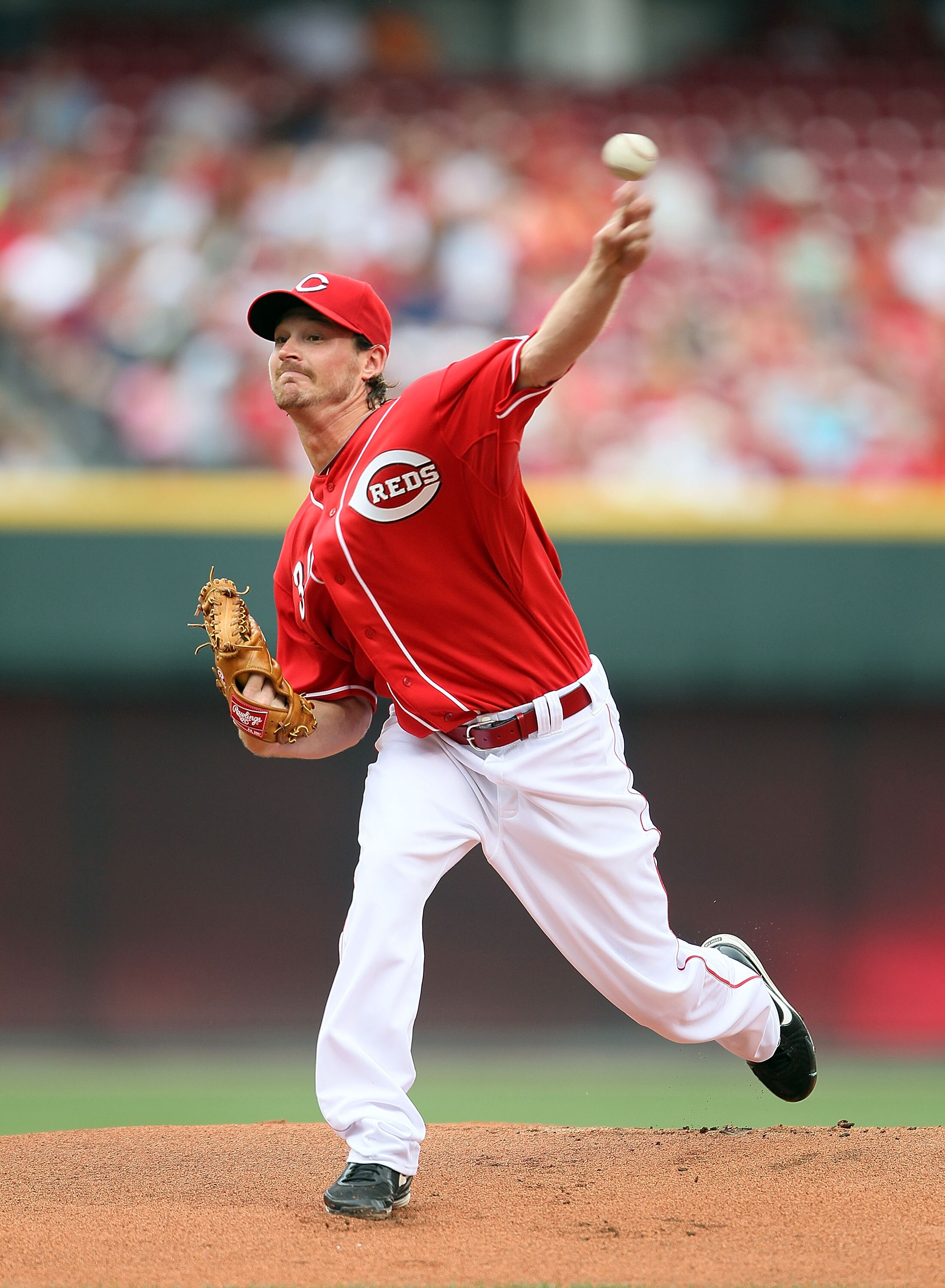 CINCINNATI - JULY 18:  Travis Wood #30 of the Cincinnati Reds throws a pitch during the game against the Colorado Rockies at Great American Ball Park on July 18, 2010 in Cincinnati, Ohio.  (Photo by Andy Lyons/Getty Images)
