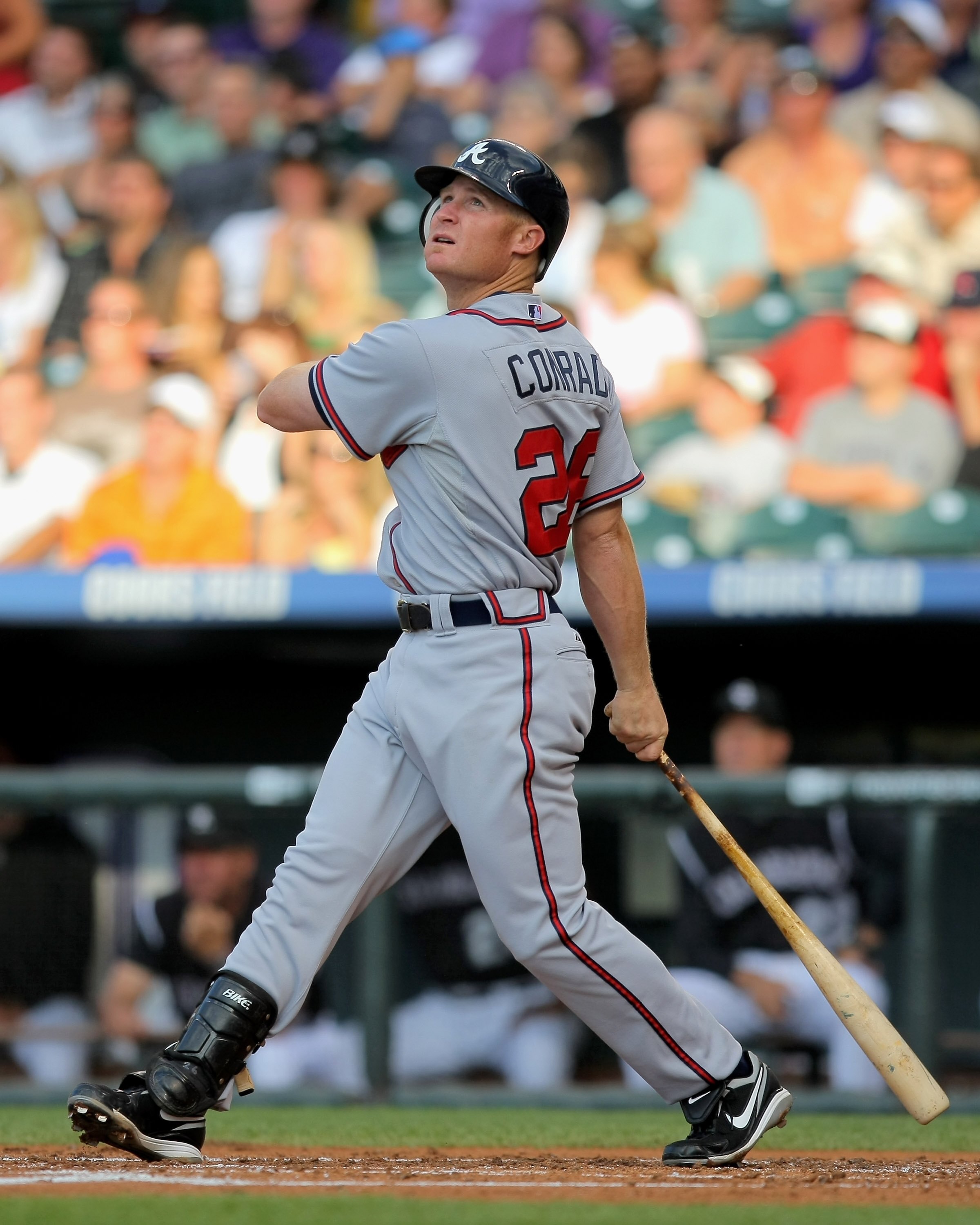 DENVER - JULY 09:  Brooks Conrad #26 of the Atlanta Braves takes an at bat against the Colorado Rockies during MLB action at Coors Field on July 9, 2009 in Denver, Colorado. The Rockies defeated the Braves 7-6.  (Photo by Doug Pensinger/Getty Images)