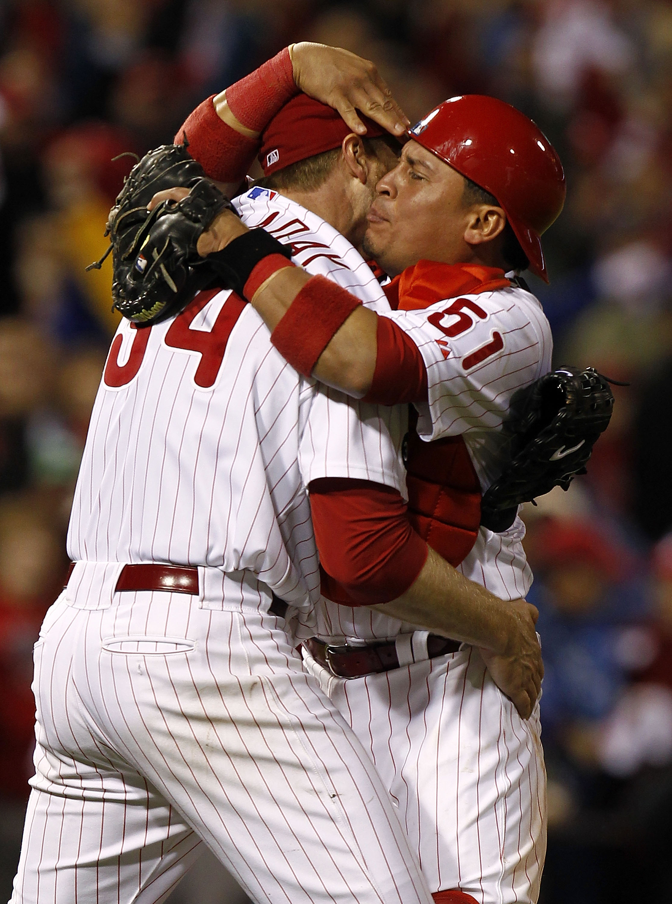 PHILADELPHIA - OCTOBER 06:  Roy Halladay #34 and Carlos Ruiz #51 of the Philadelphia Phillies celebrate Halladay's no-hitter and the win in Game 1 of the NLDS against the Cincinnati Reds at Citizens Bank Park on October 6, 2010 in Philadelphia, Pennsylvan