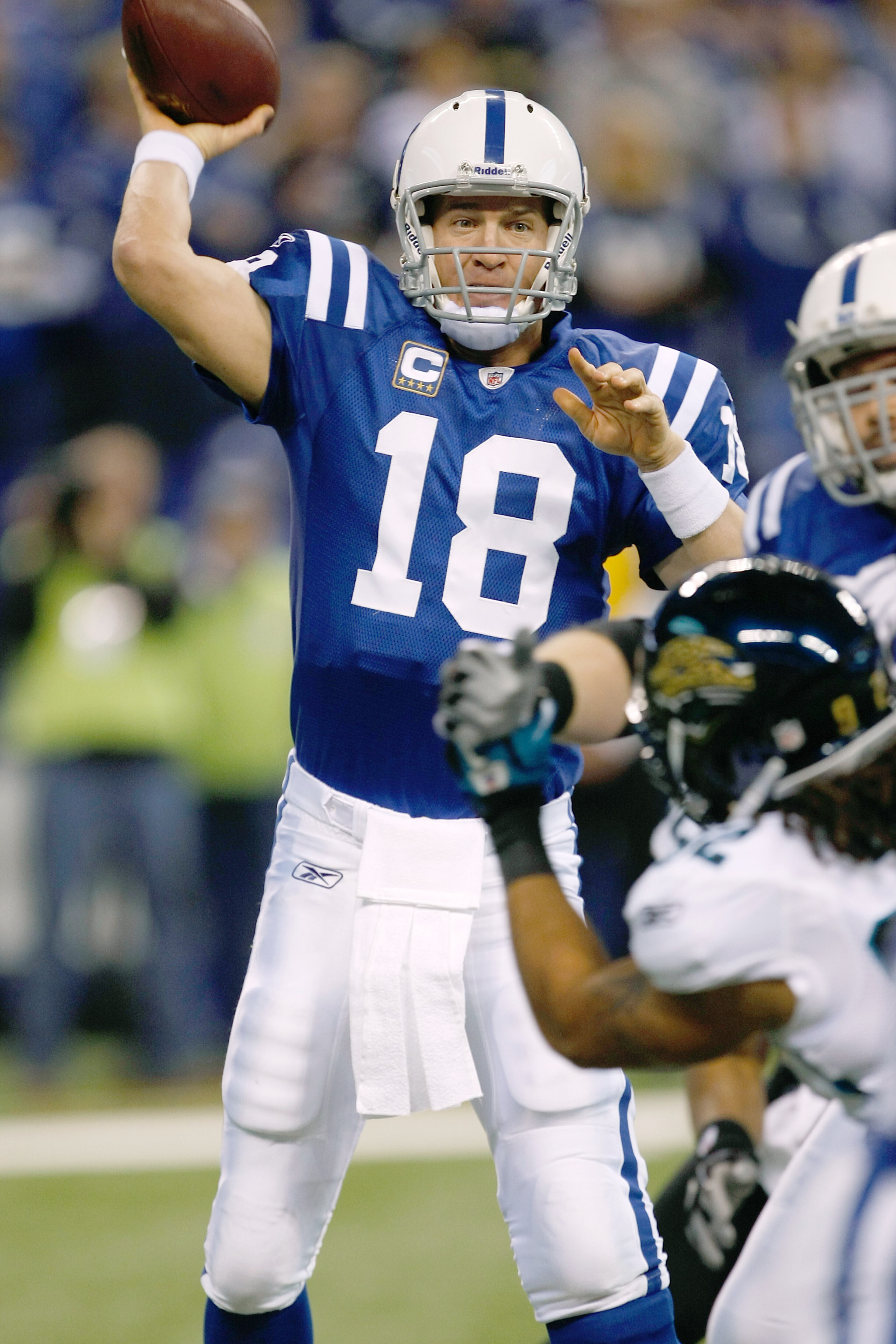 INDIANAPOLIS, IN - DECEMBER 19: Peyton Manning #18 of the Indianapolis Colts passes against the Jacksonville Jaguars at Lucas Oil Stadium on December 19, 2010 in Indianapolis, Indiana.  (Photo by Scott Boehm/Getty Images)