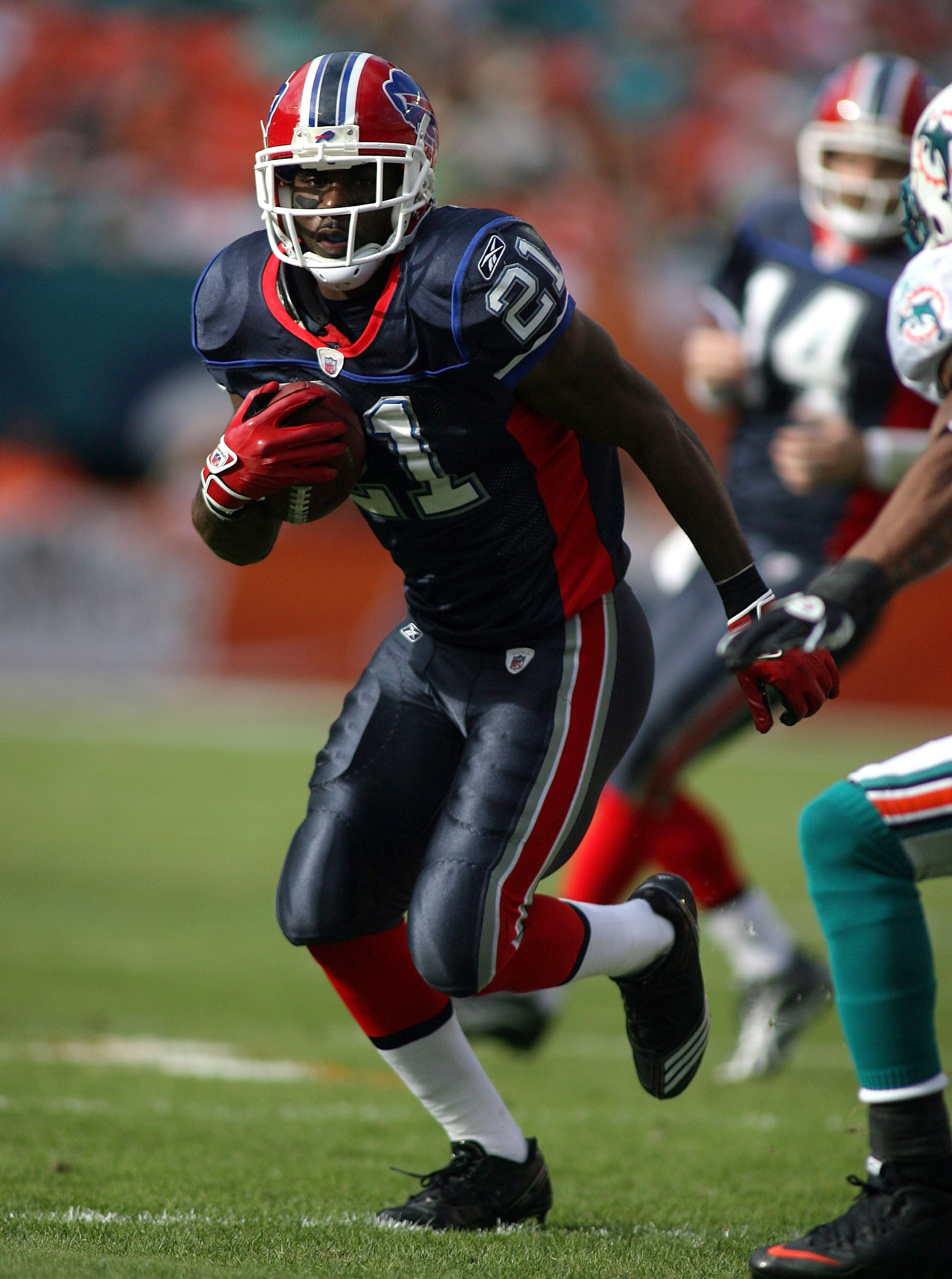 MIAMI, FL - DECEMBER 19:  Running Back C.J. Spiller #21 of the Buffalo Bills runs the ball during a game against the Miami Dolphins at Sun Life Stadium on December 19, 2010 in Miami, Florida.The Bills defeated the Dolphins 17-14.  (Photo by Marc Serota/Ge