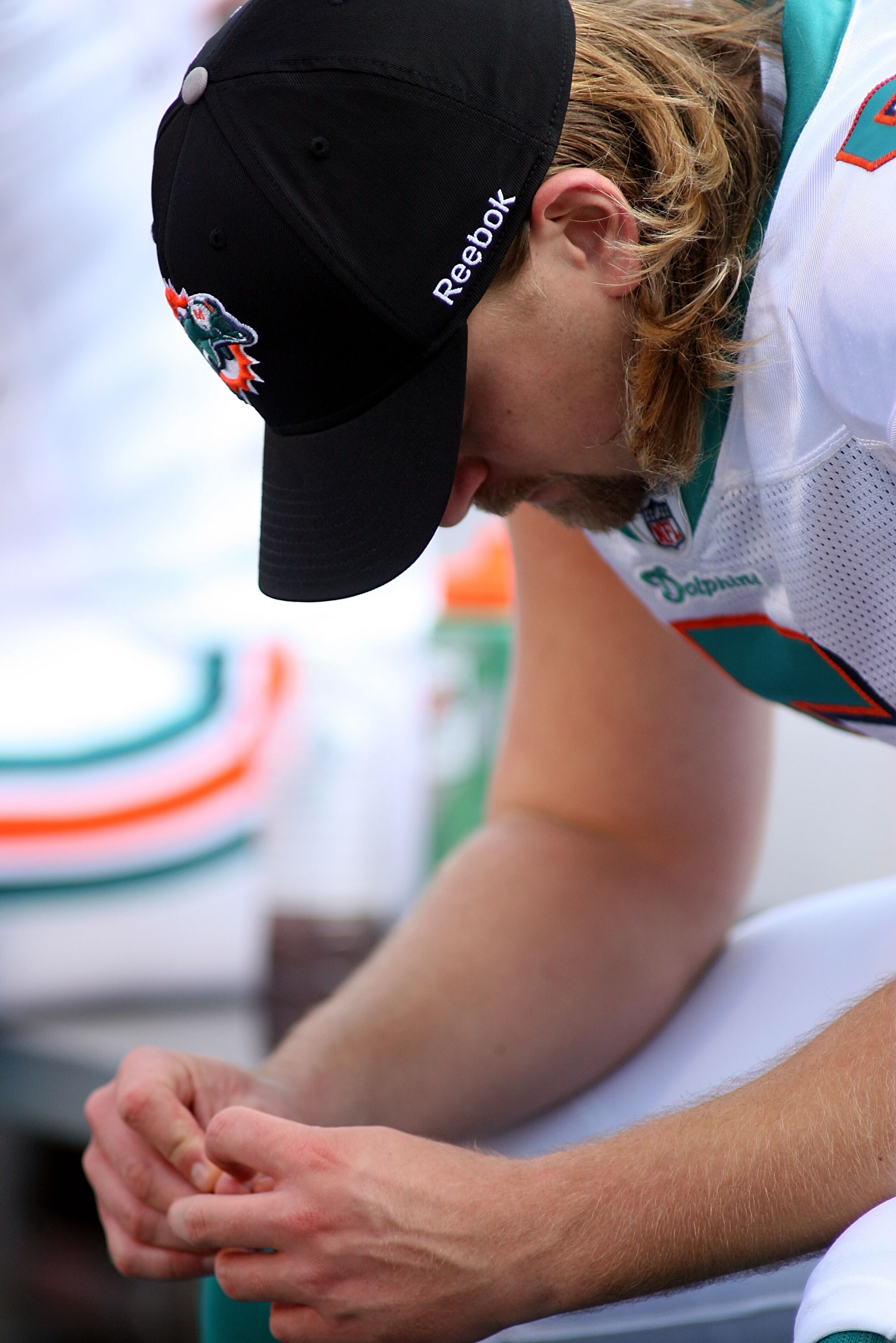 MIAMI, FL - DECEMBER 19: Kicker Dan Carpenter #5 of the Miami Dolphins reacts to missing a field goal late in the game against the Buffalo Bills at Sun Life Stadium on December 19, 2010 in Miami, Florida. The Bills defeated the Dolphins 17-14.  (Photo by