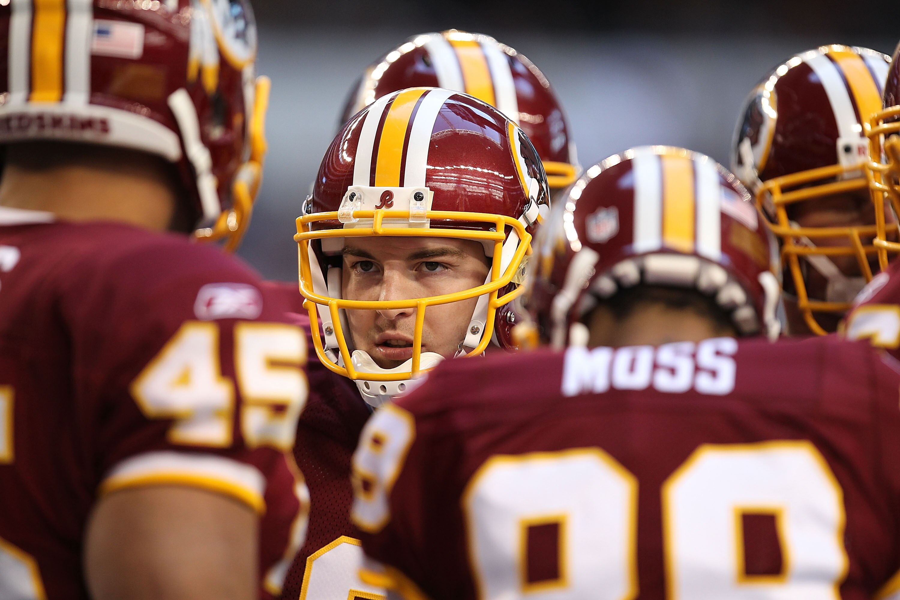 ARLINGTON, TX - DECEMBER 19:  Quarterback Rex Grossman #8 of the Washington Redskins during play against the Dallas Cowboys at Cowboys Stadium on December 19, 2010 in Arlington, Texas.  (Photo by Ronald Martinez/Getty Images)