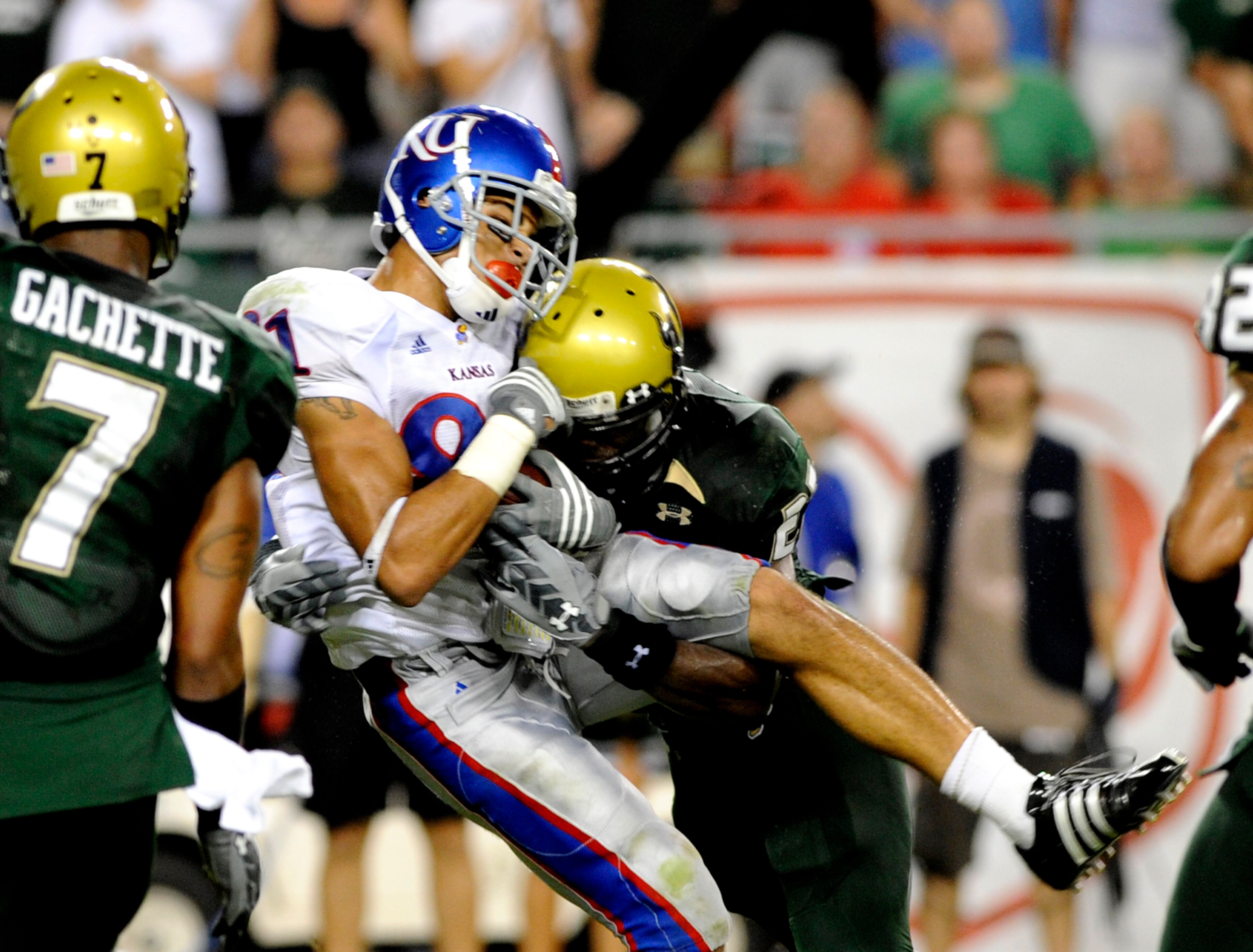 TAMPA, FL - SEPTEMBER 12: Wide receiver Jonathan Wilson  #81 of the Kansas University Jayhawks grabs a pass against the University of South Florida Bulls at Raymond James Stadium on September 12, 2008 in Tampa, Florida.  (Photo by Al Messerschmidt/Getty I