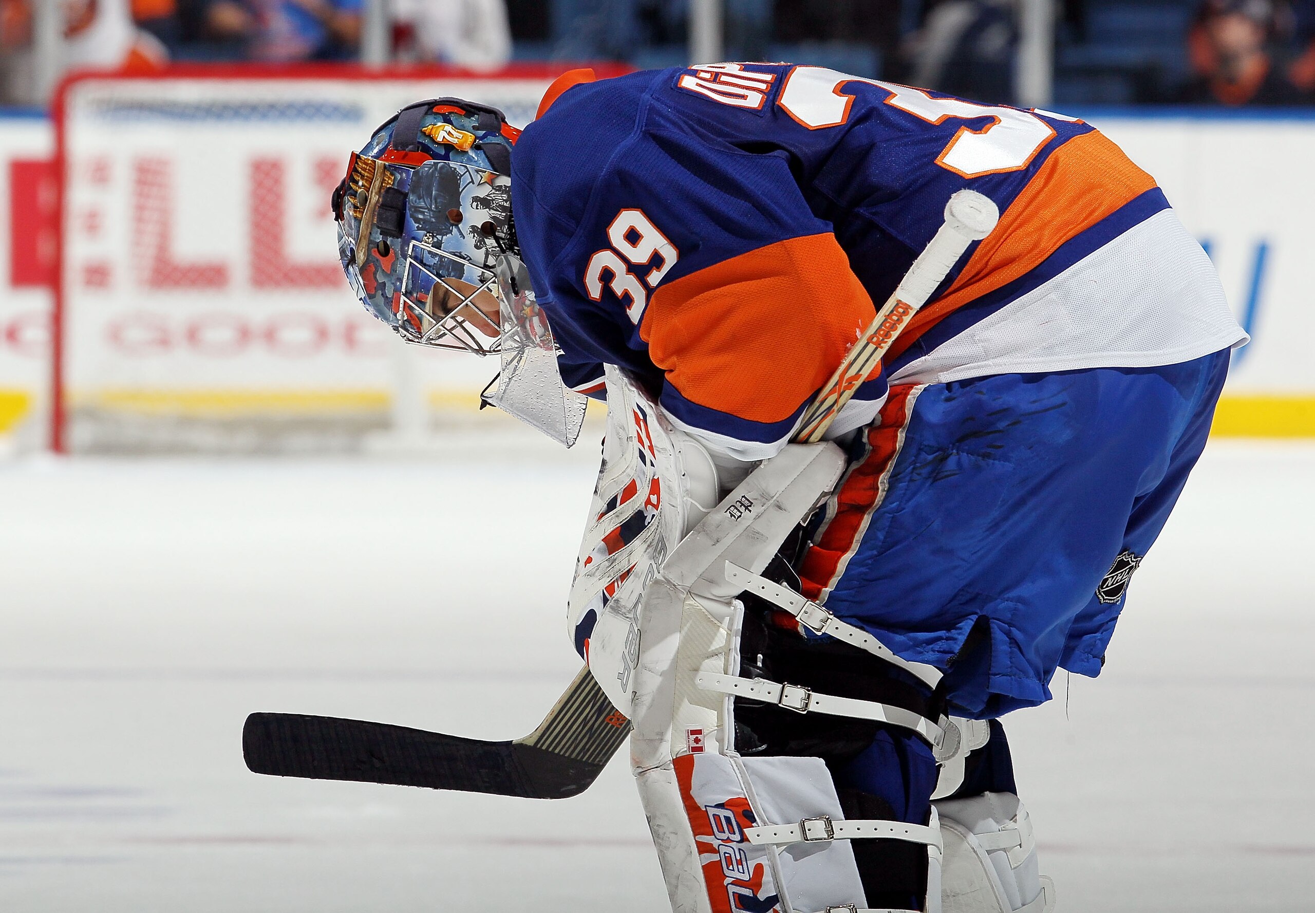 UNIONDALE, NY - DECEMBER 11: Rick DiPietro #39 of the New York Islanders looks on during a time out late in the game agianst the Atlanta Thrashers on December 11, 2010 at Nassau Coliseum in Uniondale, New York. The Thrashers defeated the Isles 5-4.  (Phot