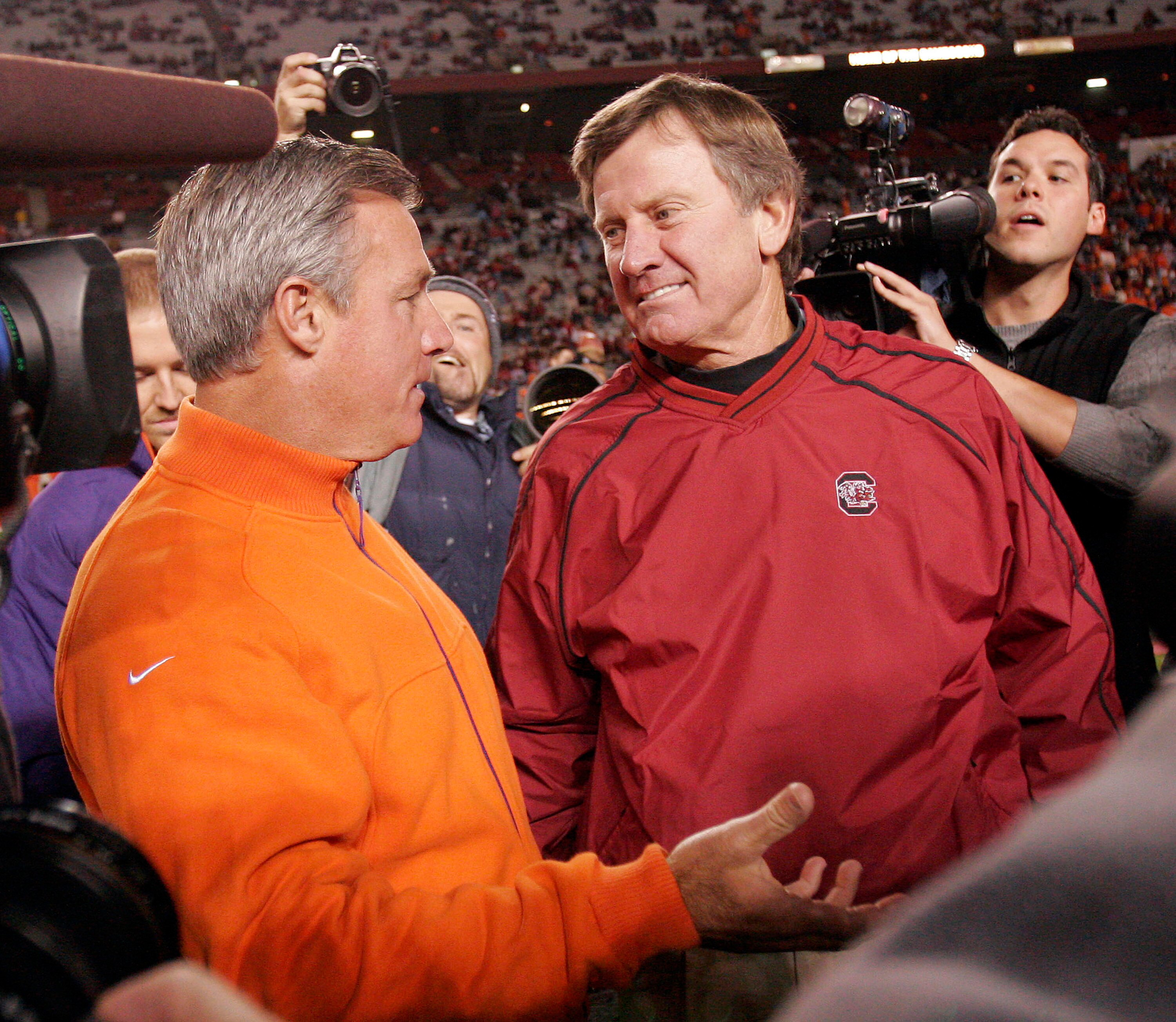 COLUMBIA, SC - NOVEMBER 19: Coach Tommy Bowden of the Clemson Tigers (L) talks with coach Steve Spurrier of the South Carolina Gamecocks on November 19, 2005, at Williams-Brice Stadium in Columbia, South Carolina. Clemson won 13-9.  (Photo By Grant Halver