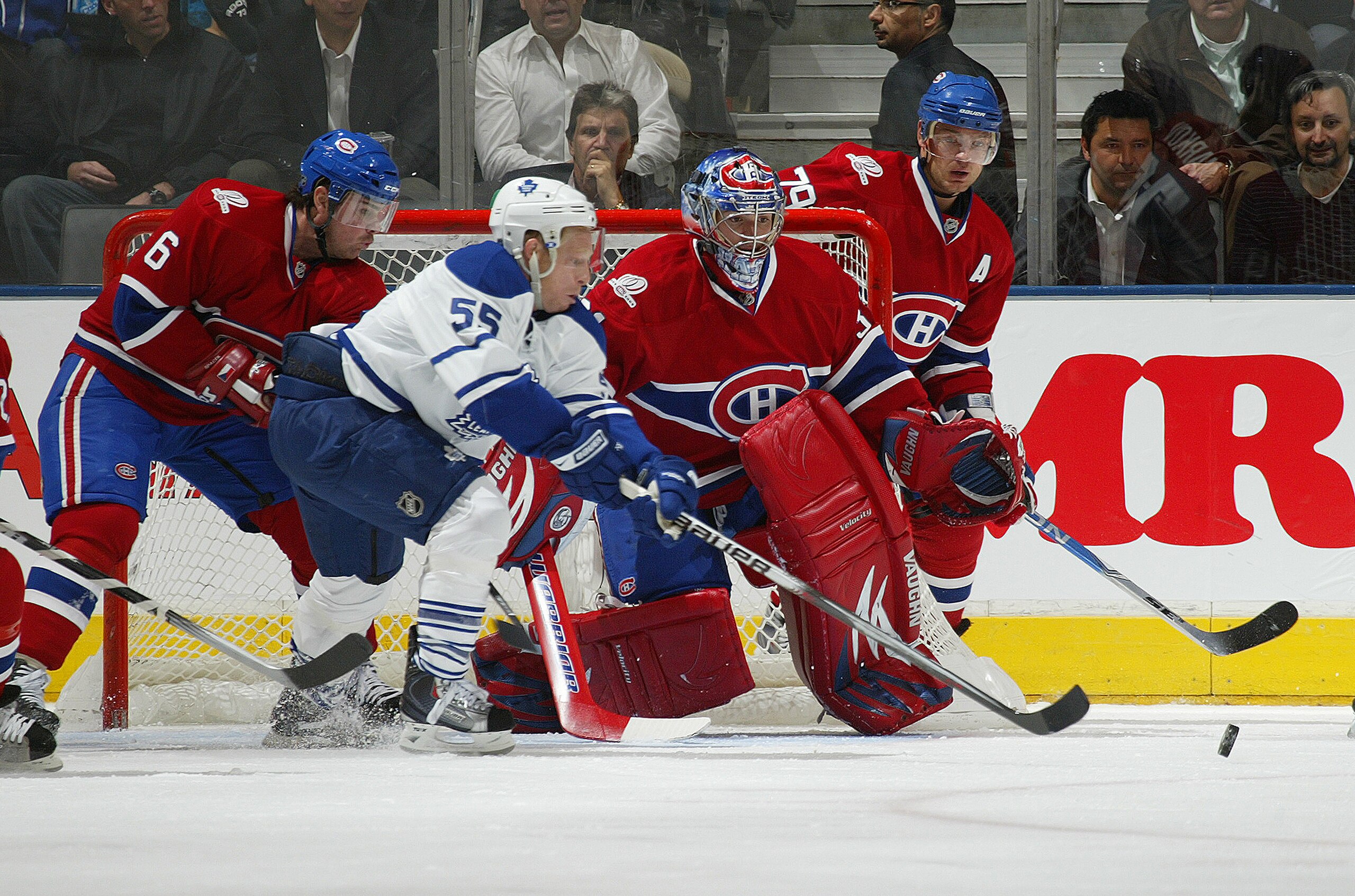 TORONTO - OCTOBER 1:  Carey Price #31 of the Montreal Canadiens watches a loose puck get away from Jason Blake #55 of the Toronto Maple Leafs in the Maple Leafs home opener on October 1, 2009 at the Air Canada Centre in Toronto, Ontario, Canada.  (Photo b