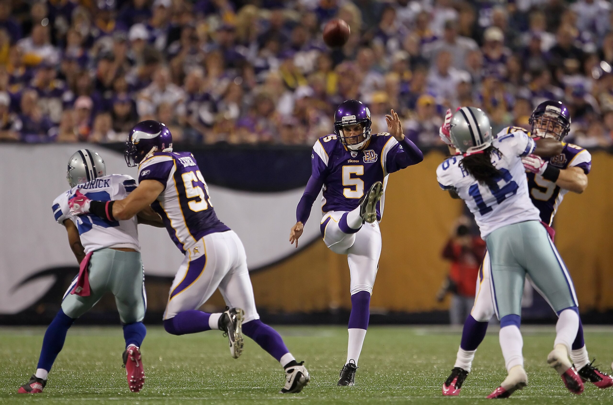 MINNEAPOLIS - OCTOBER 17:  Chris Kluwe #5 of the Minnesota Vikings kicks during the game at Mall of America Field on October 17, 2010 in Minneapolis, Minnesota.  (Photo by Jeff Gross/Getty Images)